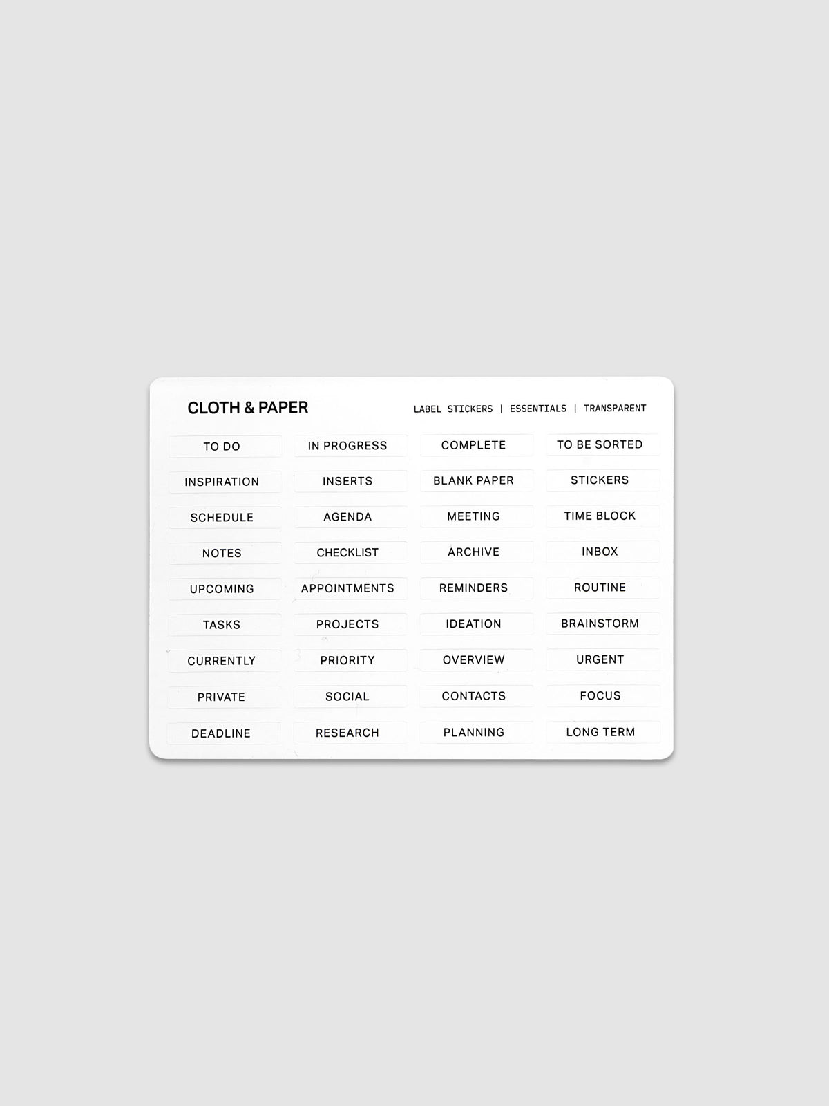One sheet of transparent label stickers with black printed text on the theme of essentials.