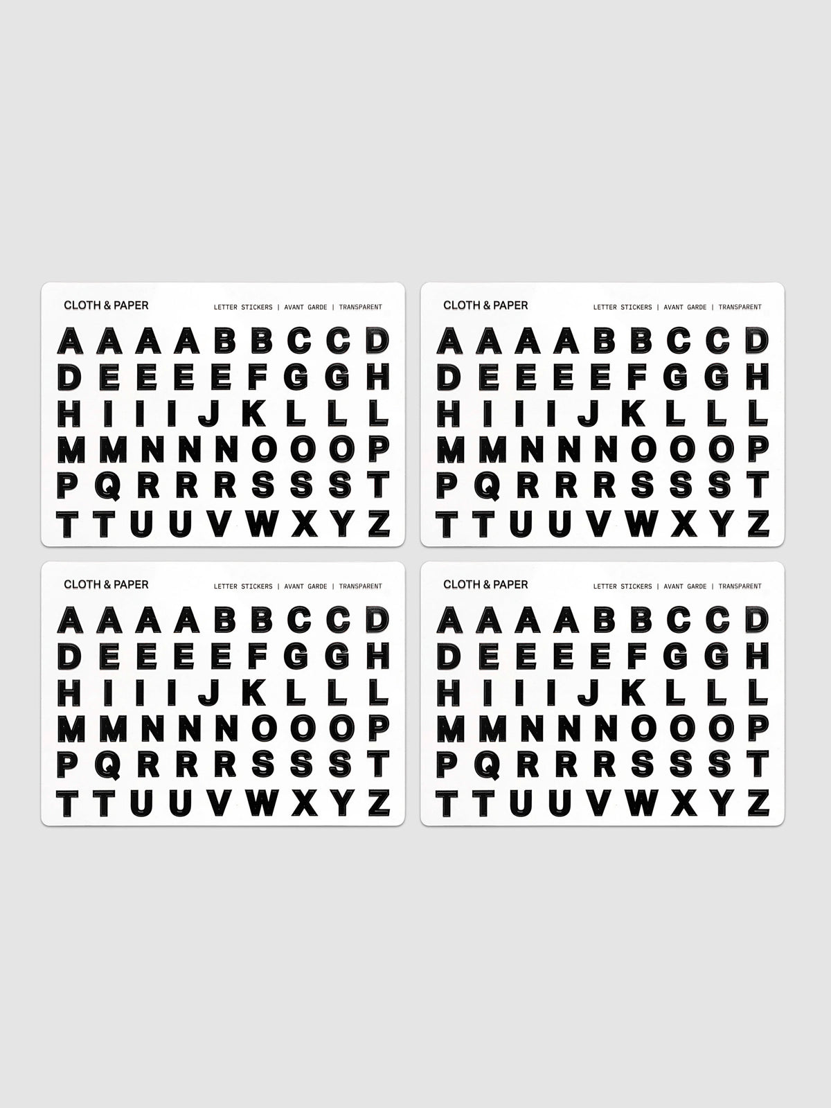 Letter Stickers Transparent, four-sheet set fanned out showing full A–Z alphabet in bold black letters on clear backing