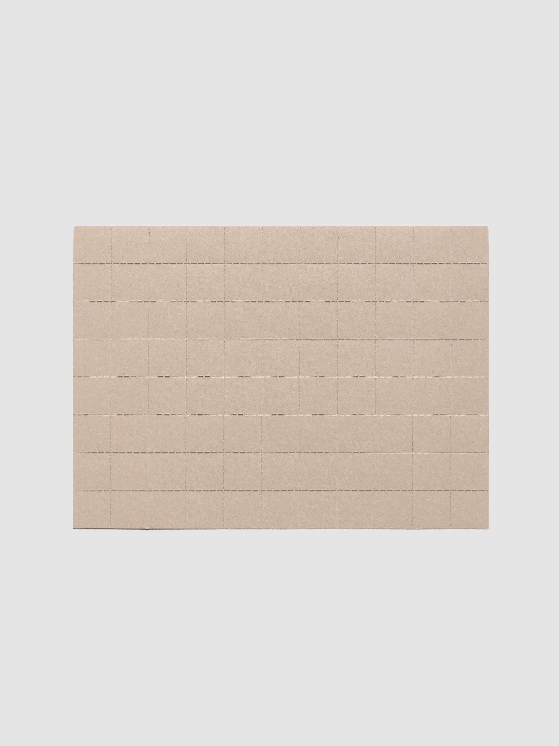 One sheet of beige tear-off stickers