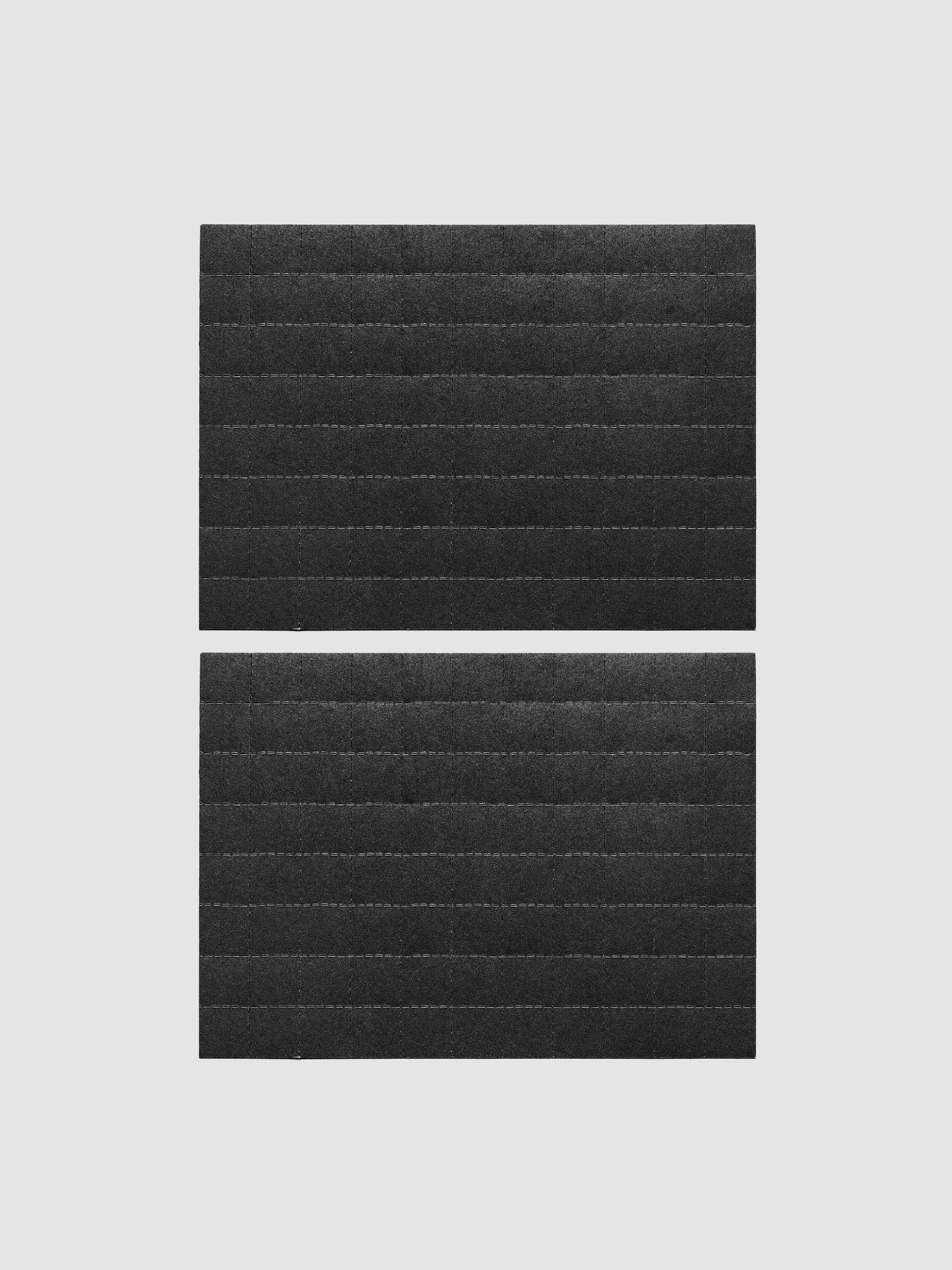 Two sheets of black tear-off stickers
