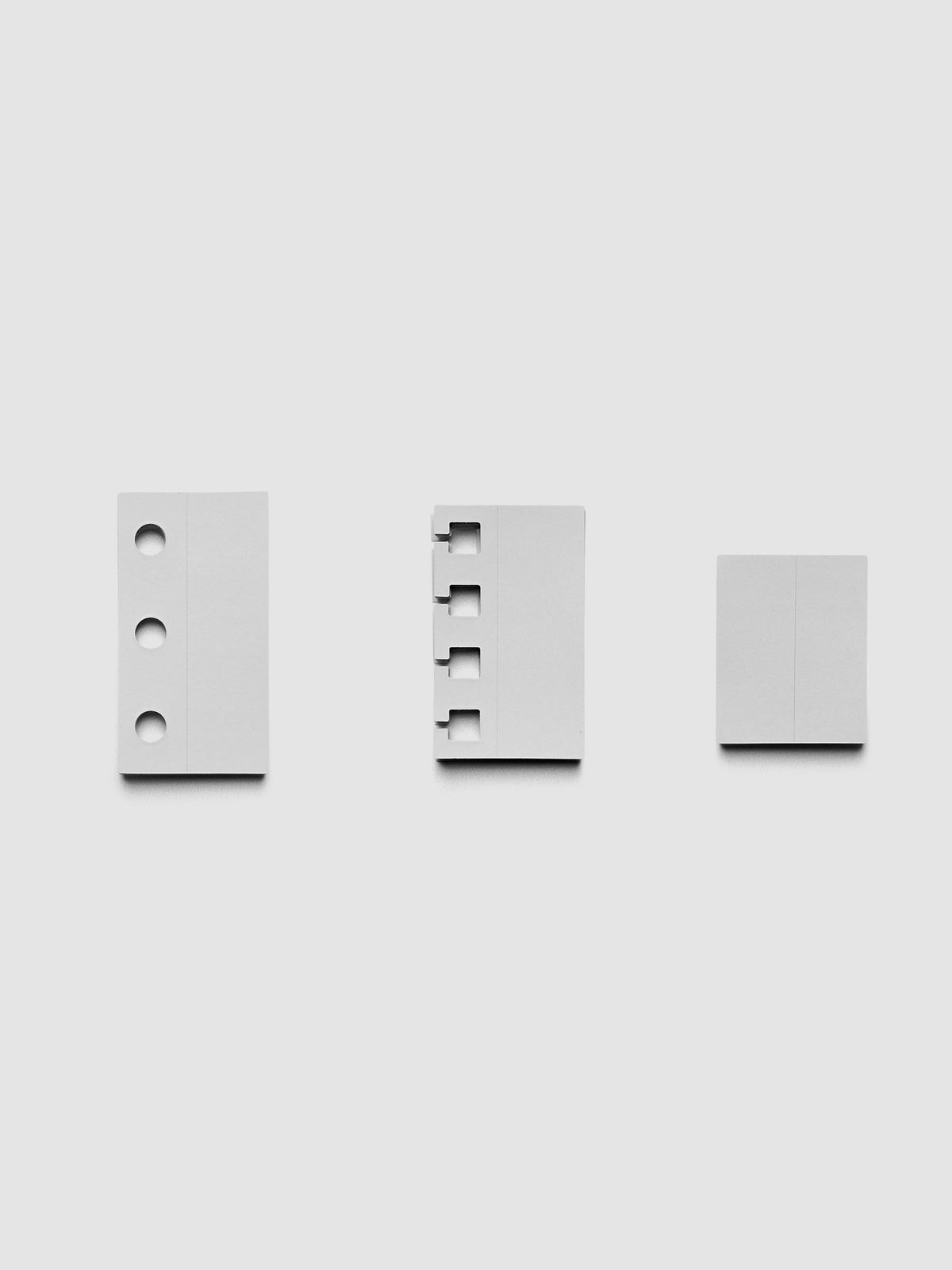 One of each system punch stickers in the ring punch option, including ring punch, spiral punch, and unpunched.