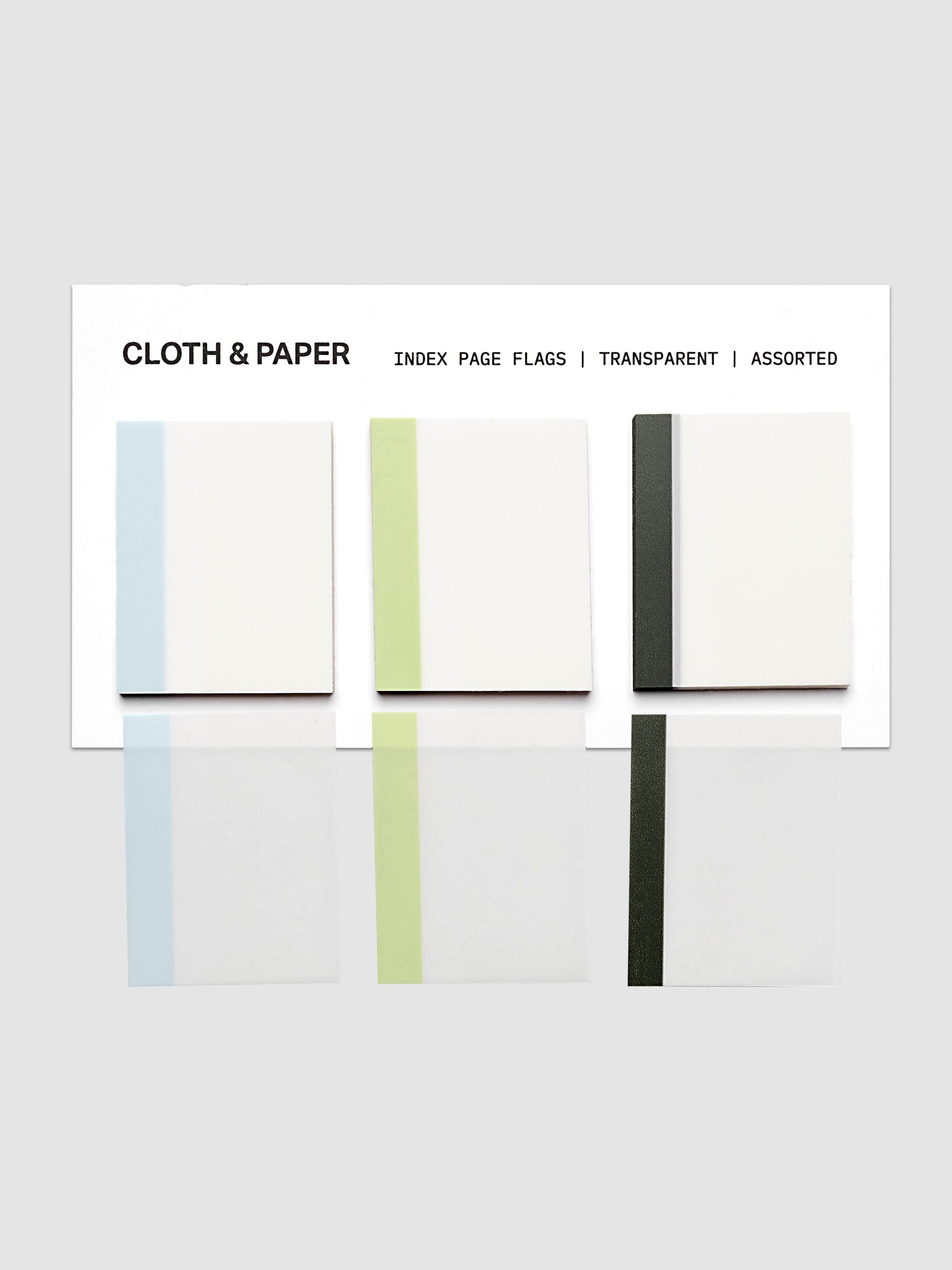 Index Page Flag Set in light blue, light green, and charcoal on a backing card with one flag of each color peeled off and displayed below