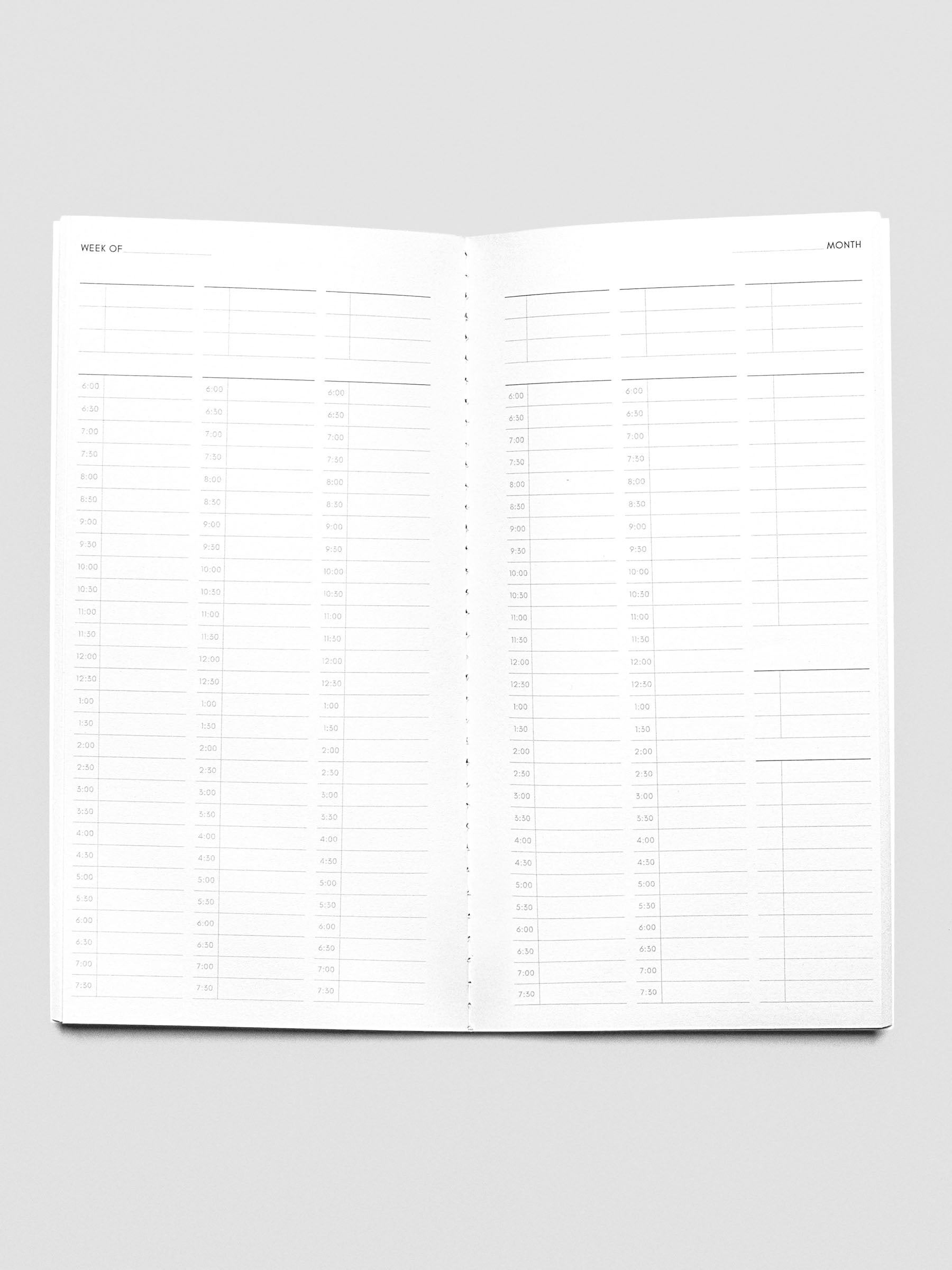 Travel Notebook in size A5 Slim in color Bordeaux with 30 Minute Time Block pages with inner pages shown.