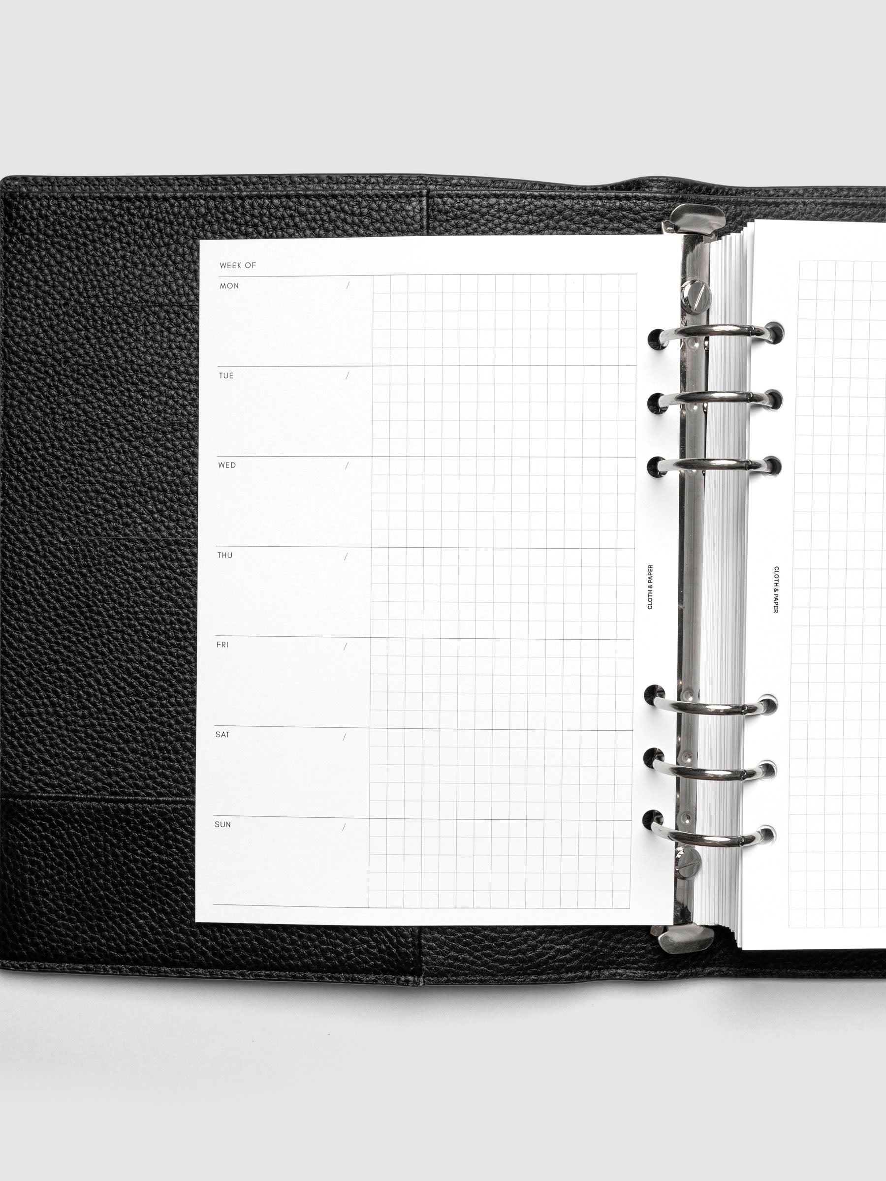 Weekly Graph Inserts in size A5 shown ring bound.