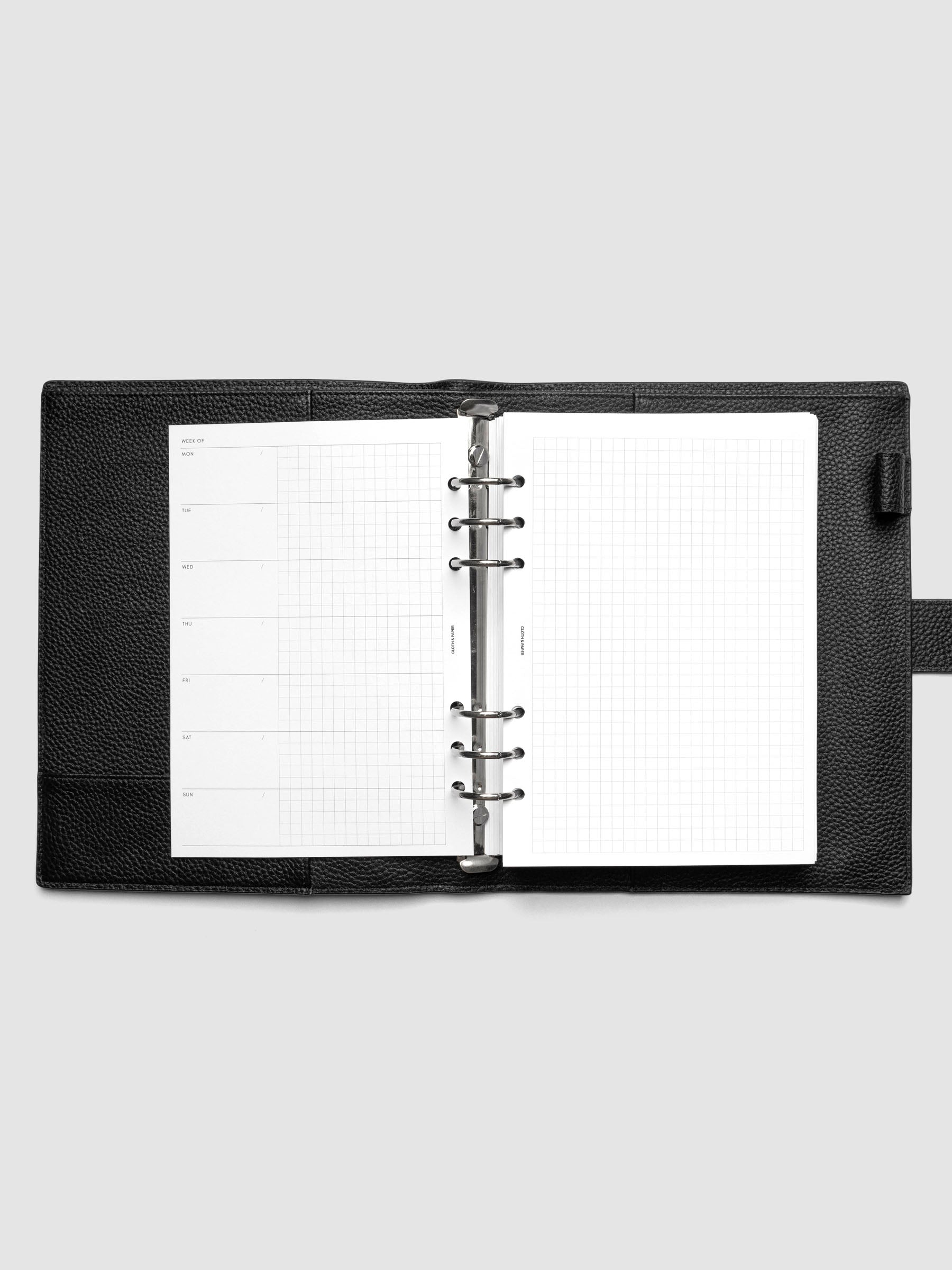 Weekly Graph Inserts in size A5 shown ring bound.