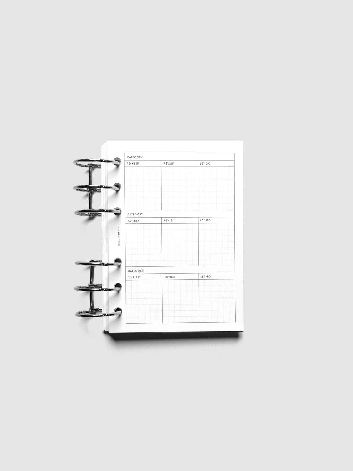 Declutter Planner Inserts in size A6 shown ring bound.
