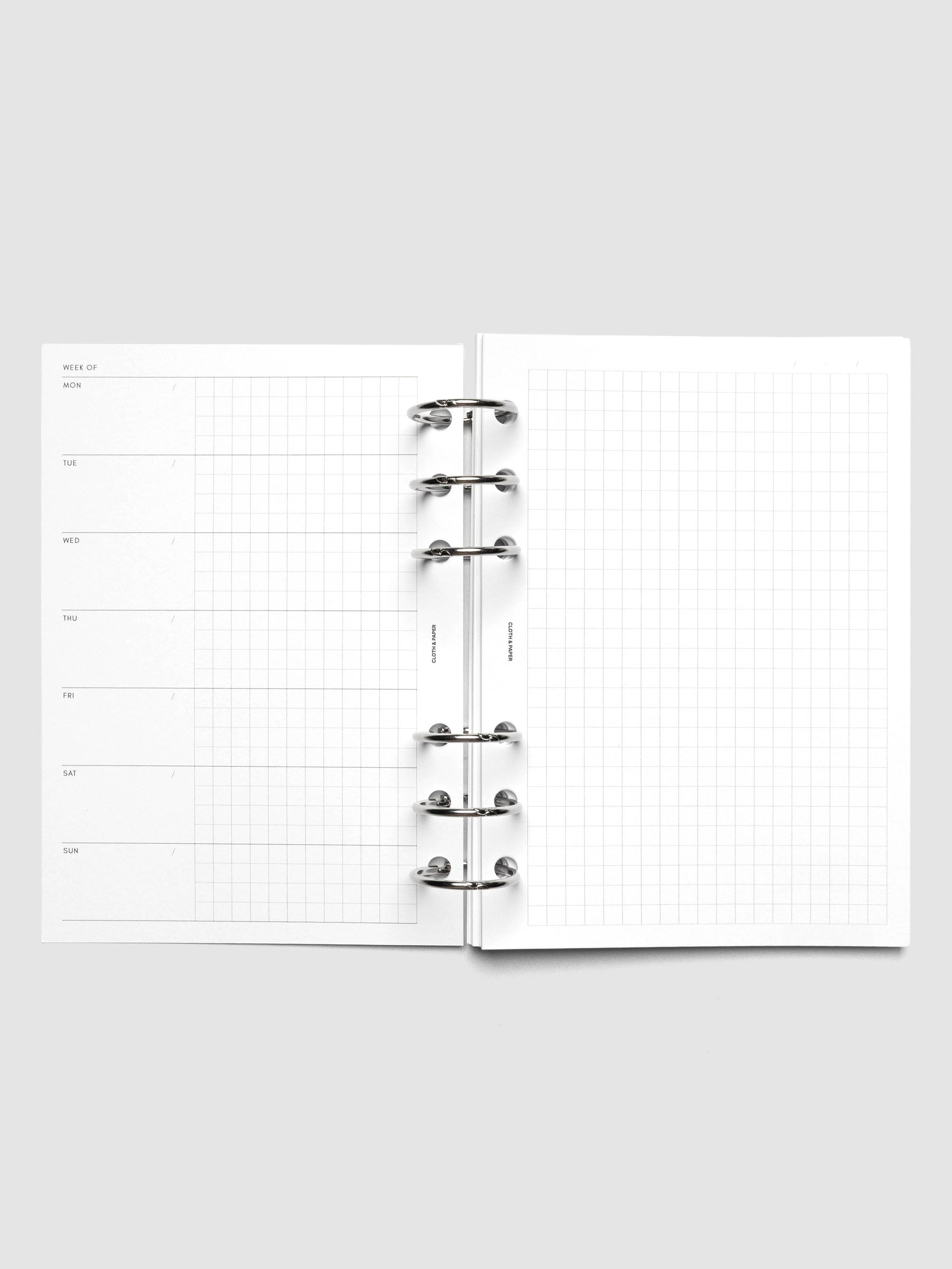 Weekly Graph Inserts in size A6 shown ring bound.