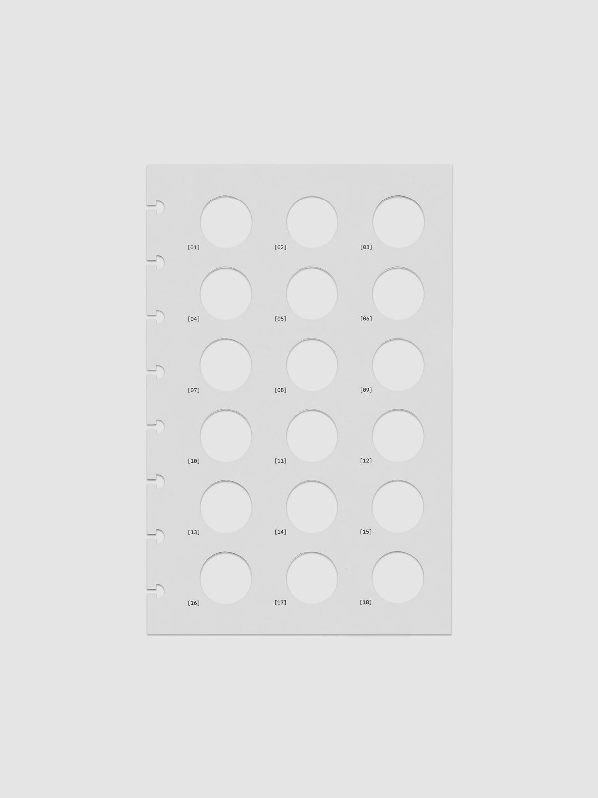 One transparent dashboard with 18 circular cut outs. One piece from the Inner Blueprint Dashboard Duo shown in size Half Letter.