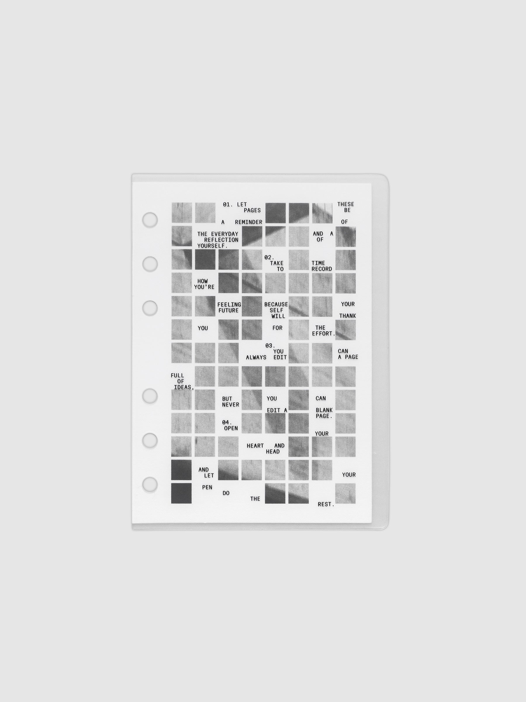 Clear planner cover with black printed text paired with a photographic black and white dashboard. Shown pre-punched for 6-ring planners in the size A6.
