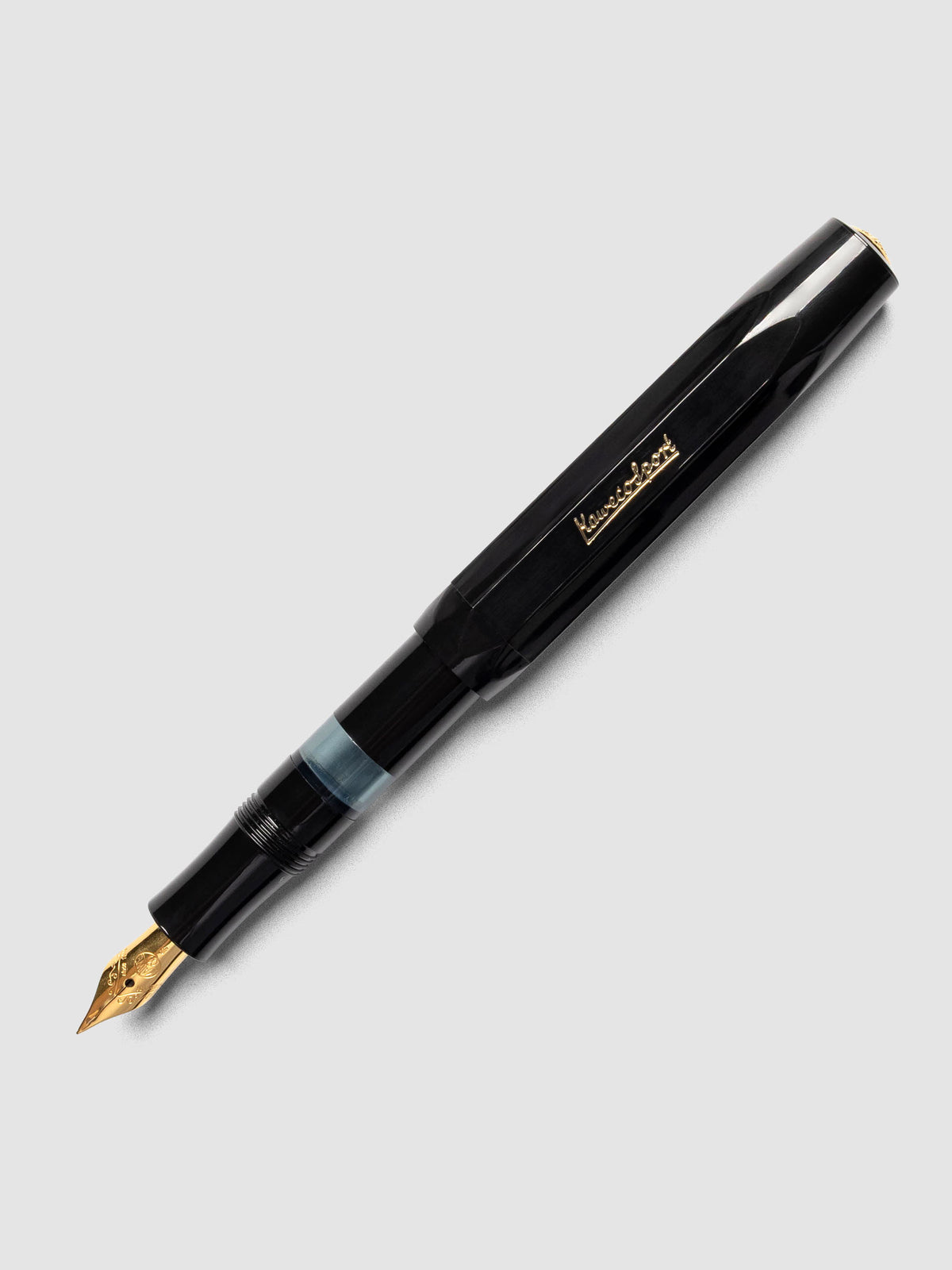 Black fountain pen shown with cap posted.