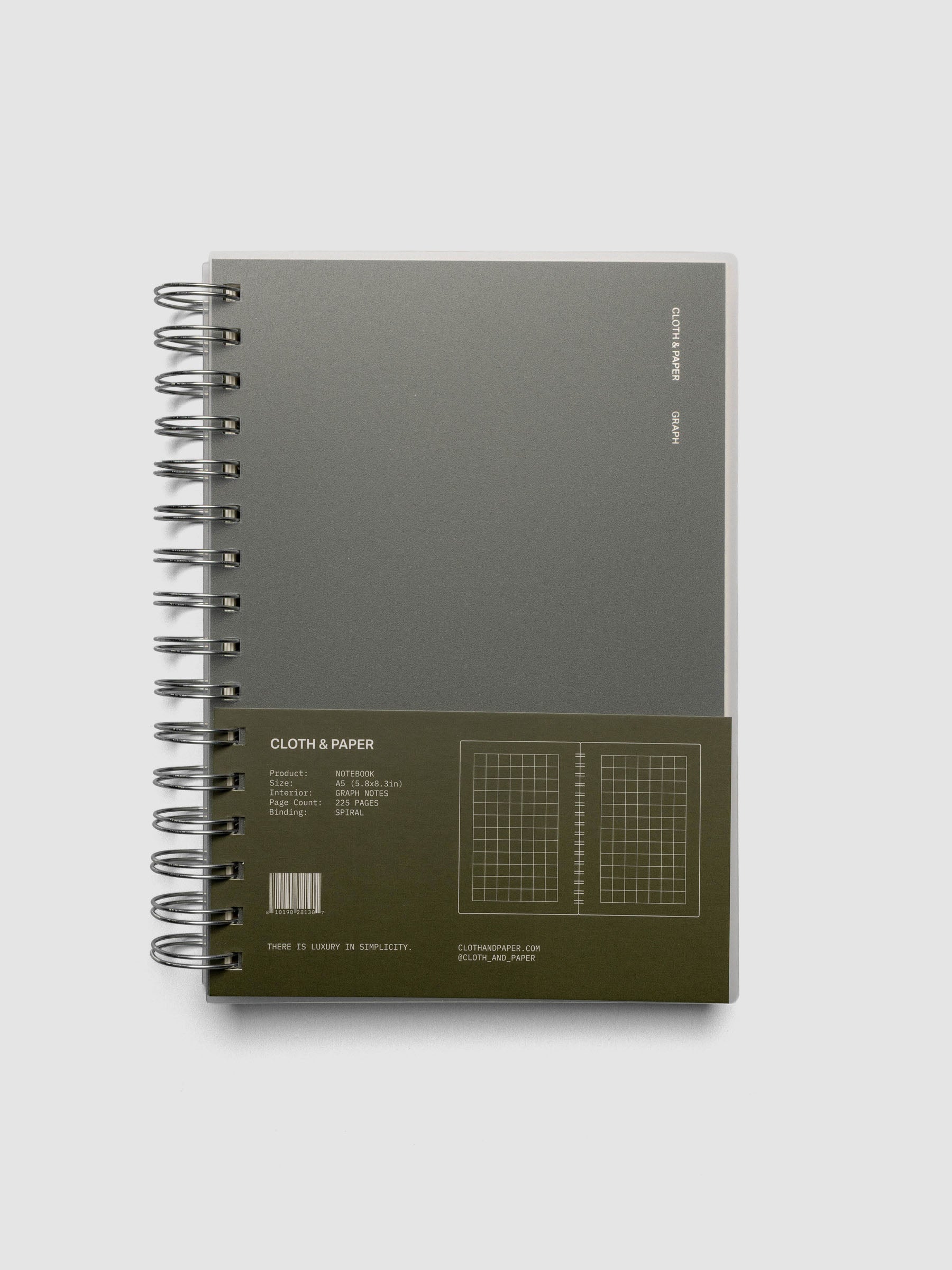 Spiral Notebook in size A5 and color Olive green with graph note interior pages shown closed with packaging.