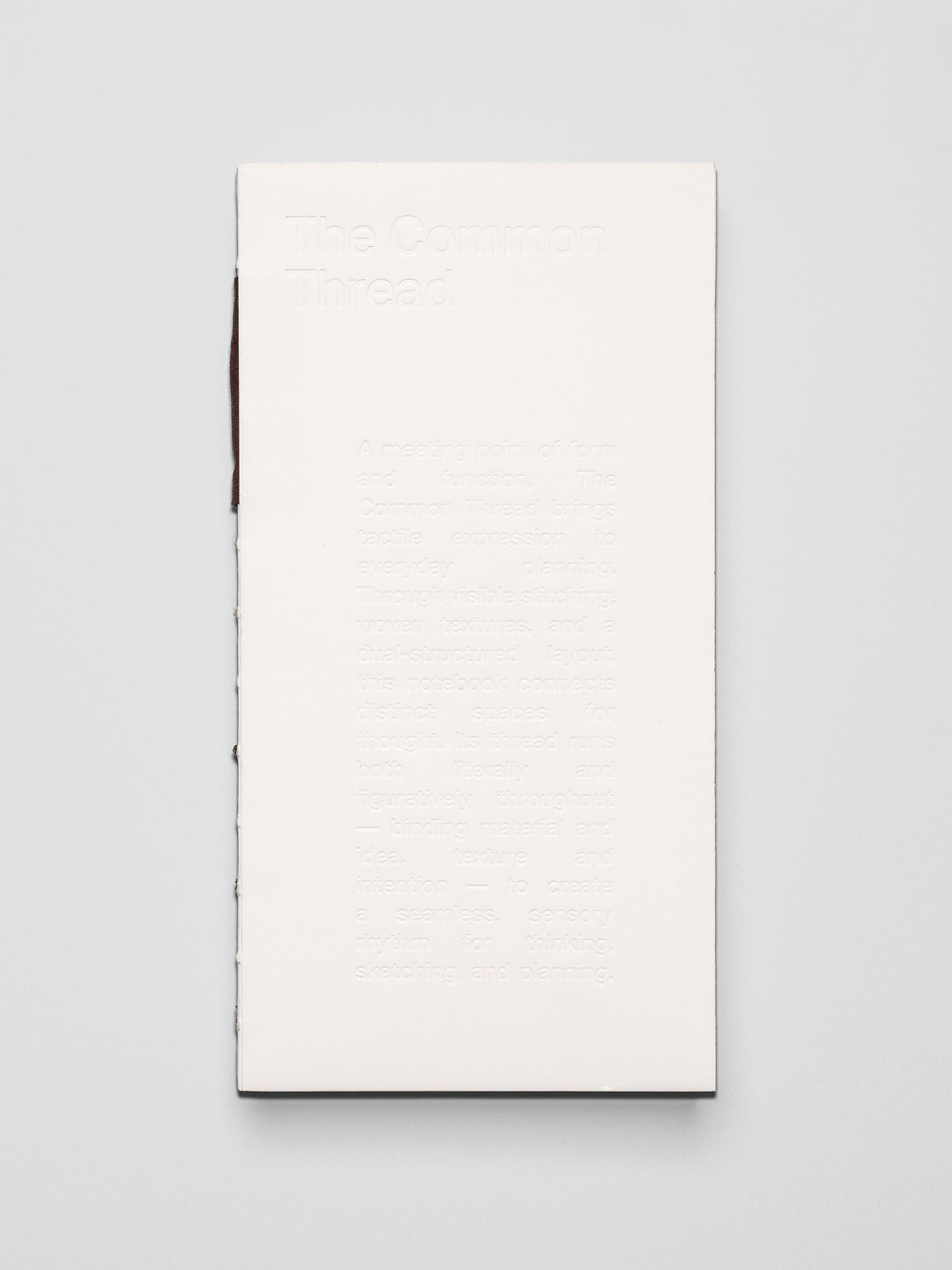 One Common Thread Notebook showing the white cover.