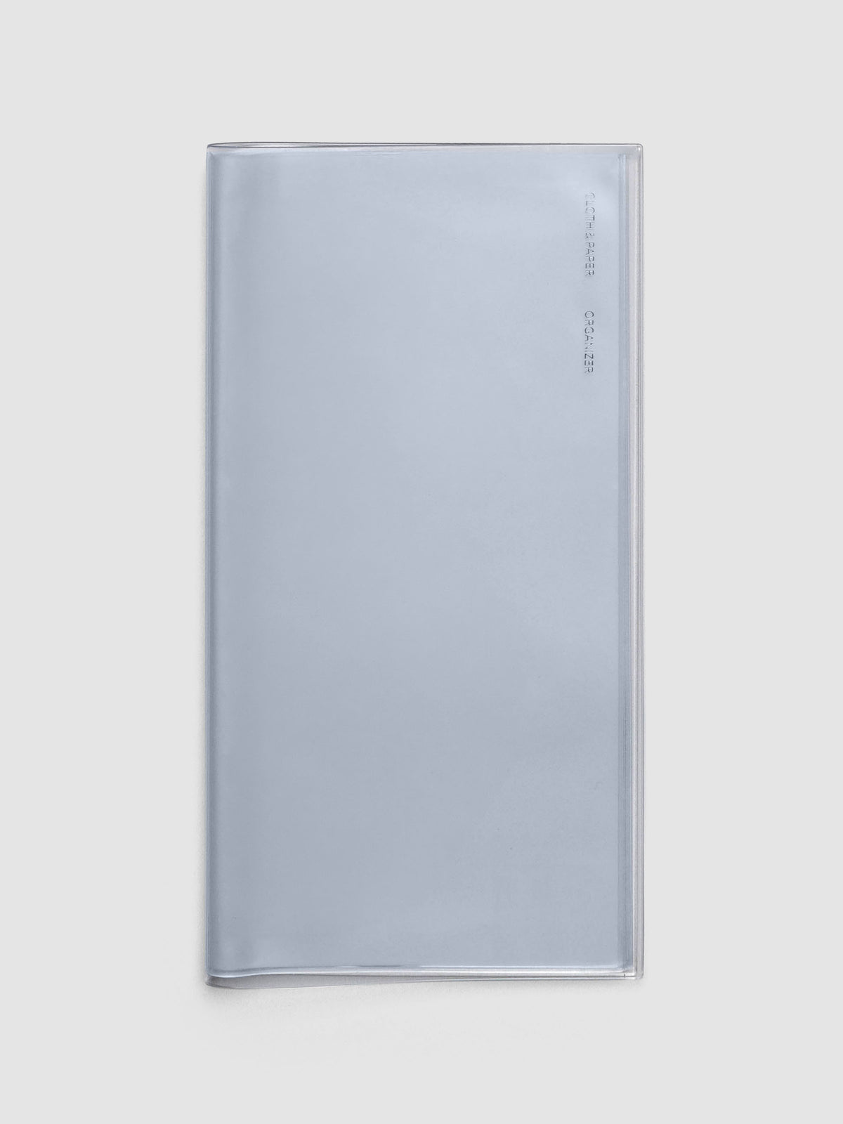A5 Slim sized clear organizer for stickers or ephemera with a clear vinyl cover.