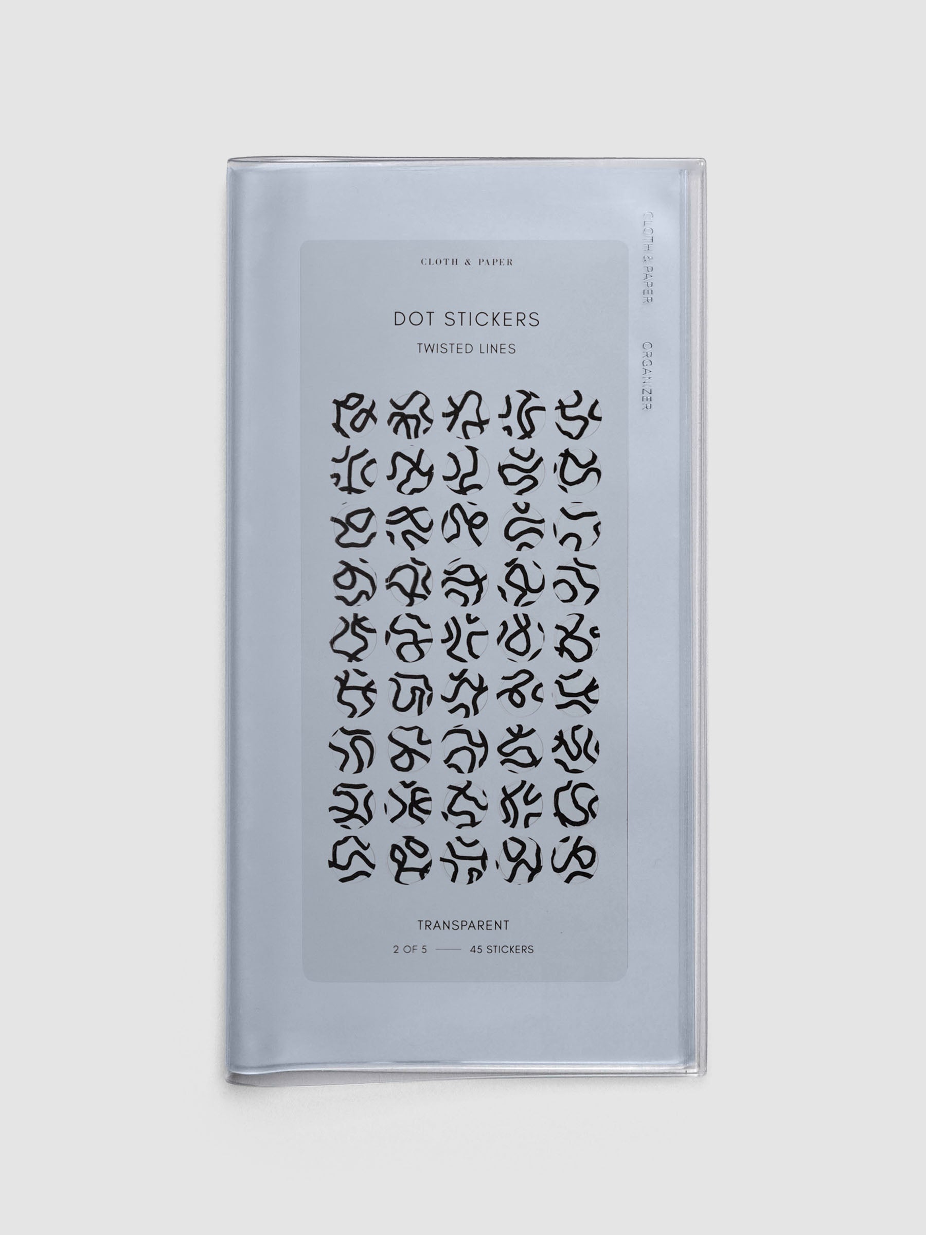 A5 Slim sized clear travel organizer with a sheet of dot stickers inside.