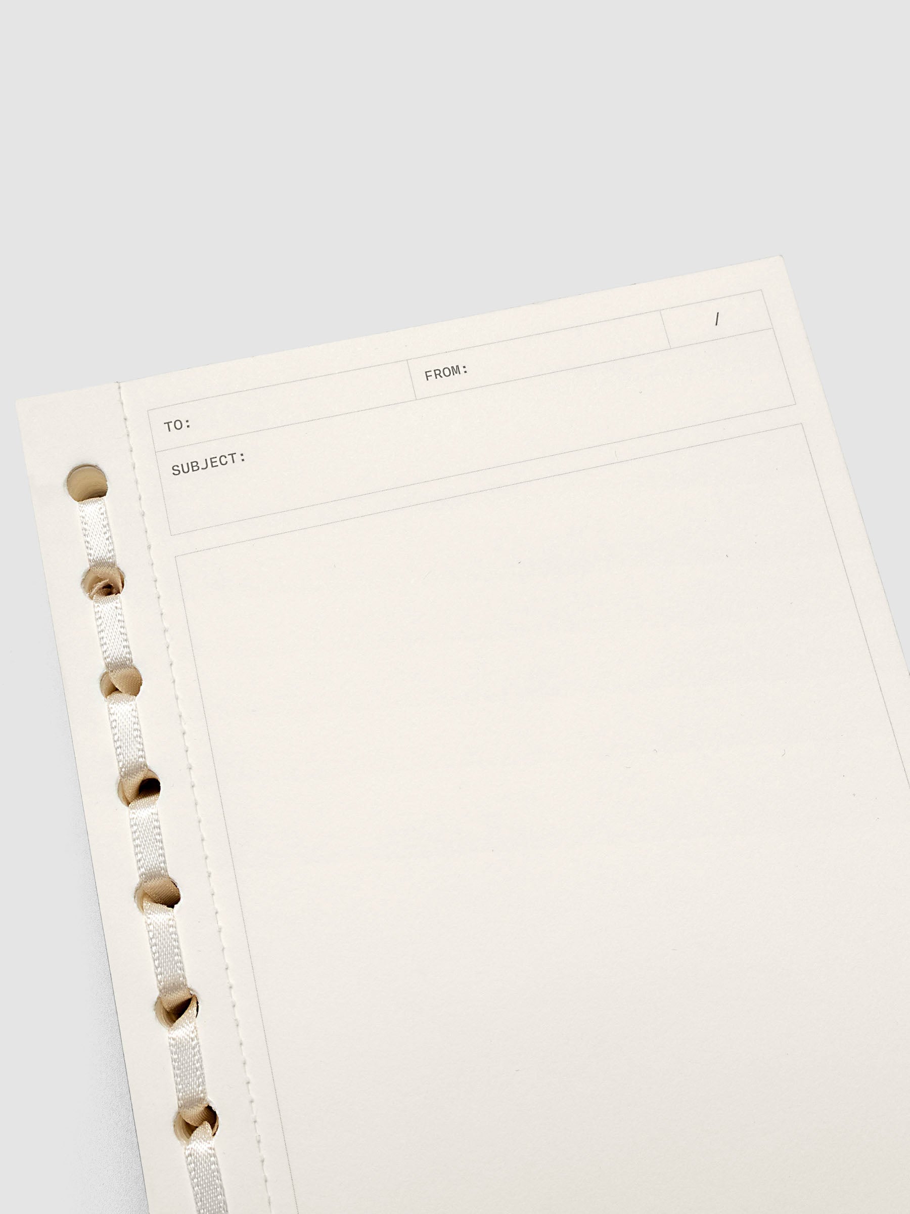 Close up of the Message Pad showing headers for to, from, date, and subject.