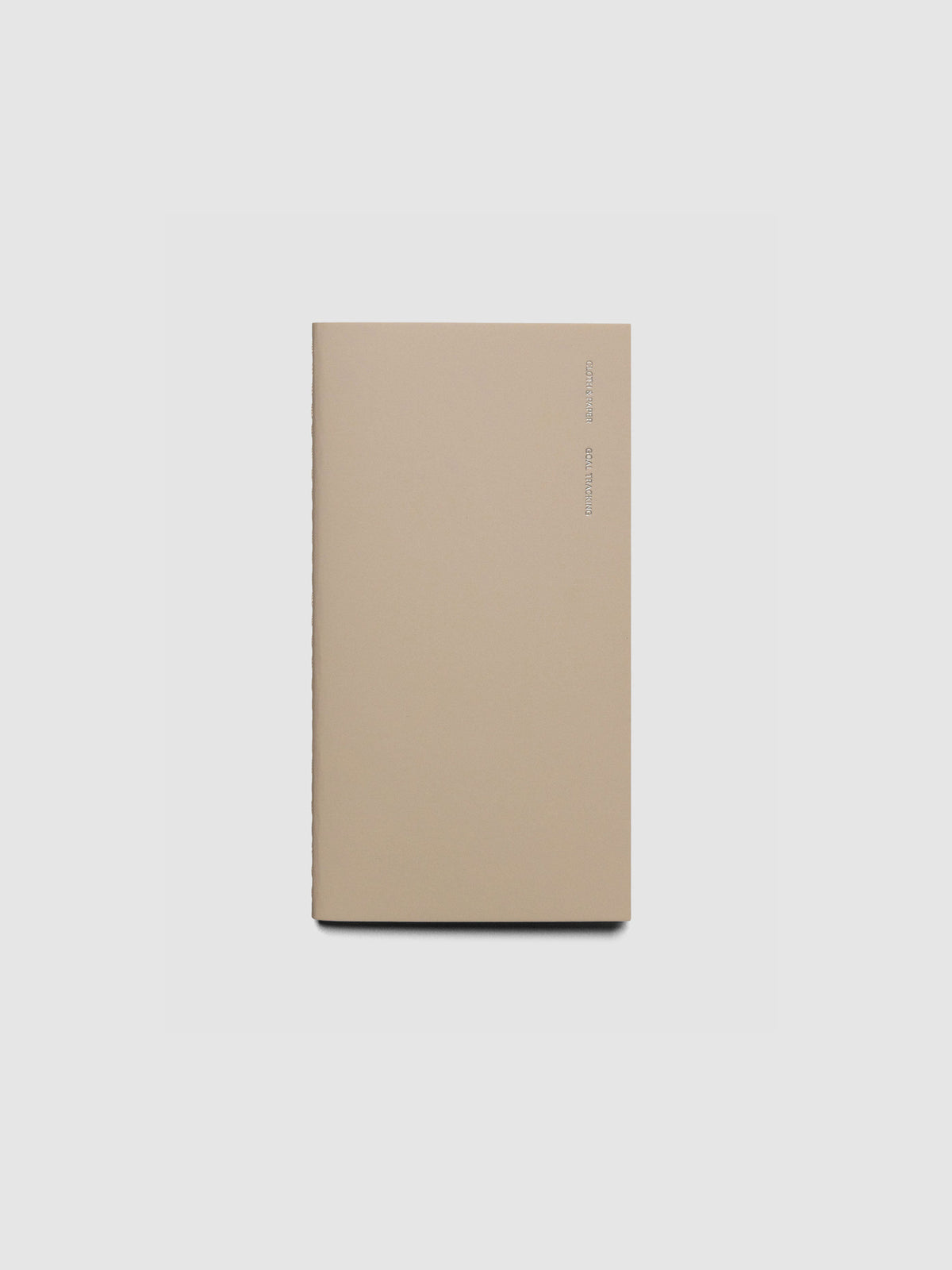 Travel Notebook in size Pocket Plus in color Ibiza with Goal Tracking pages shown closed.