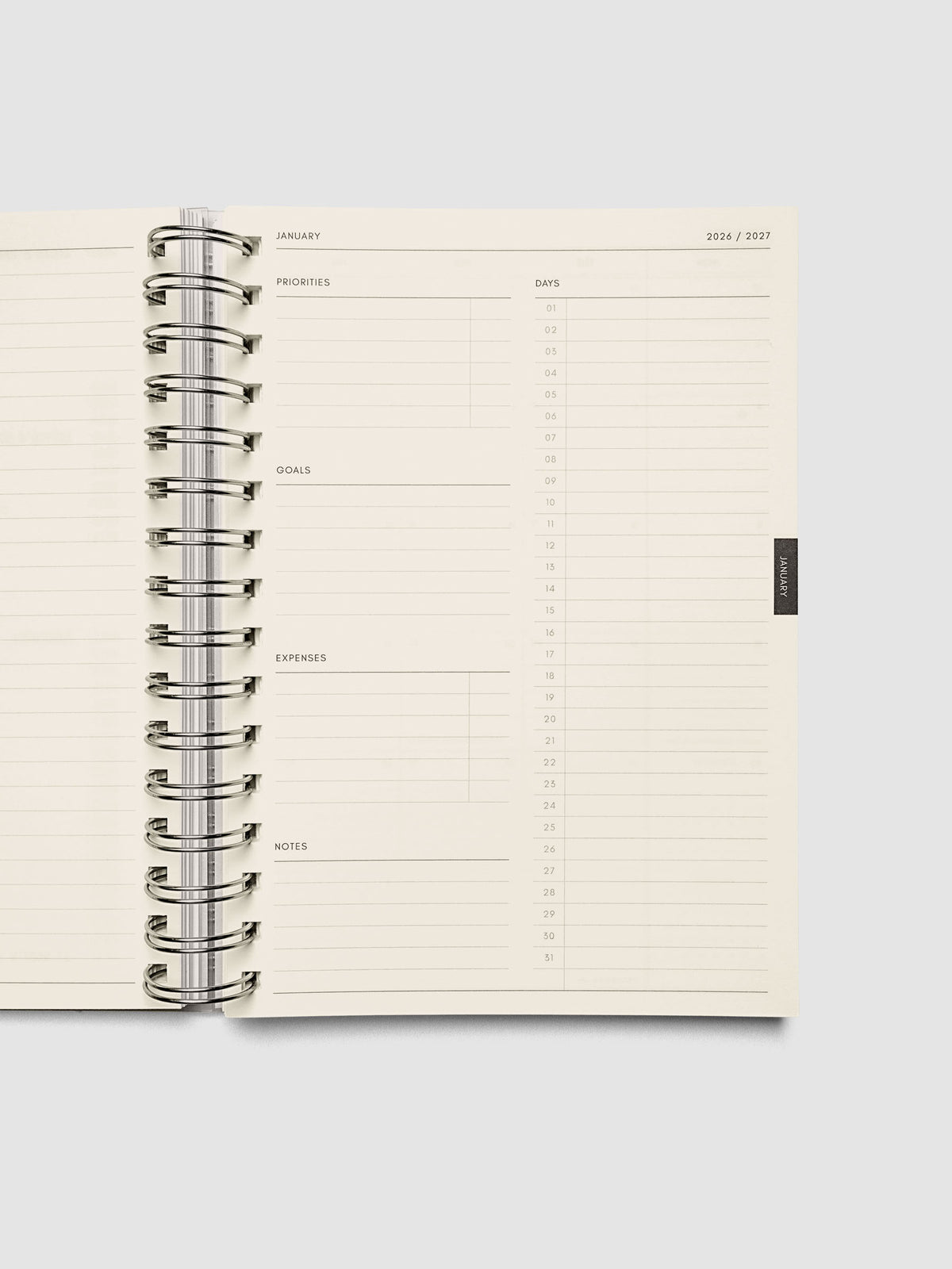 Monthly overview page showing daily planning sections alongside columns for priorities, goals, expenses, and notes, from the 2026–2027 Weekly Horizontal Academic Planner A5 Spiral