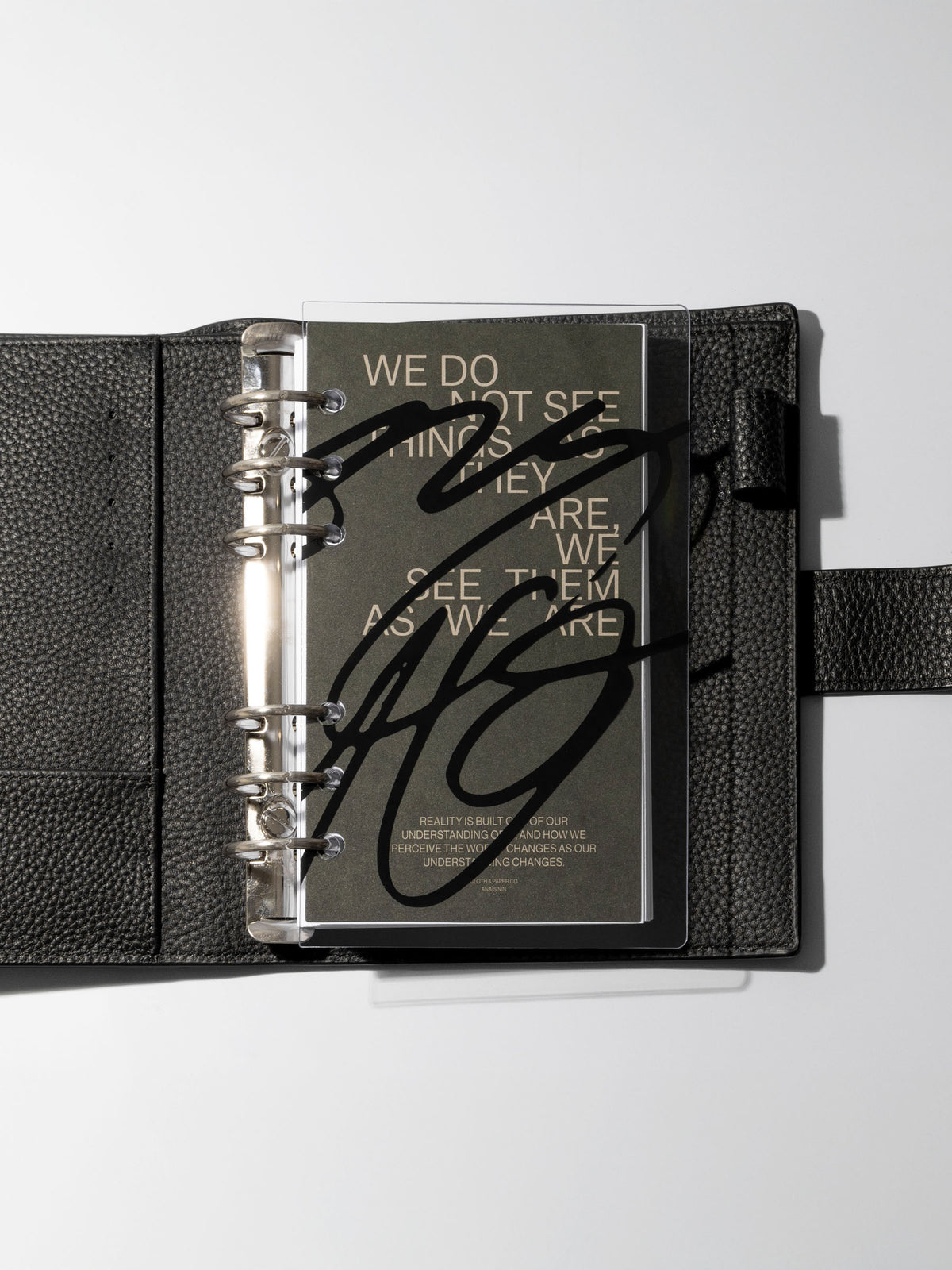 As We Are Cover + Dashboard Set in size Personal shown ring bound in a black leather agenda.