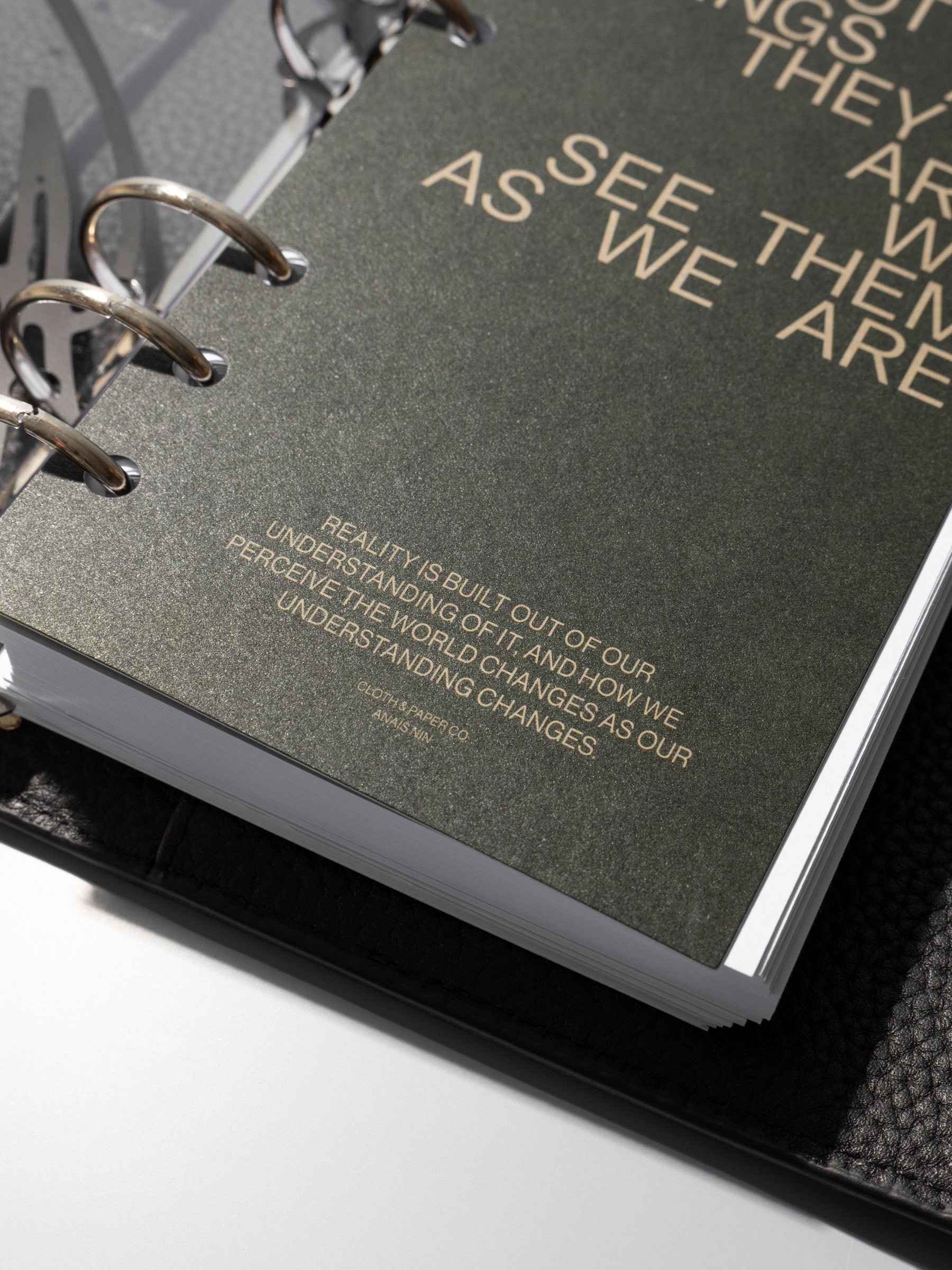 As We Are Cover + Dashboard Set in size Personal shown ring bound in a black leather agenda close up.