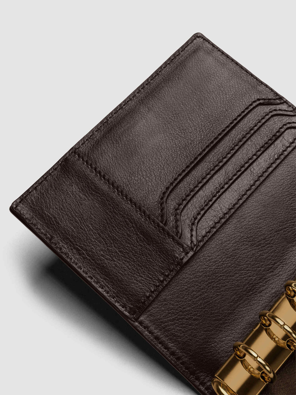 Heirloom Ring Cover Genuine Leather Pocket 6-Ring Punch in dark brown, detail view of credit card pockets