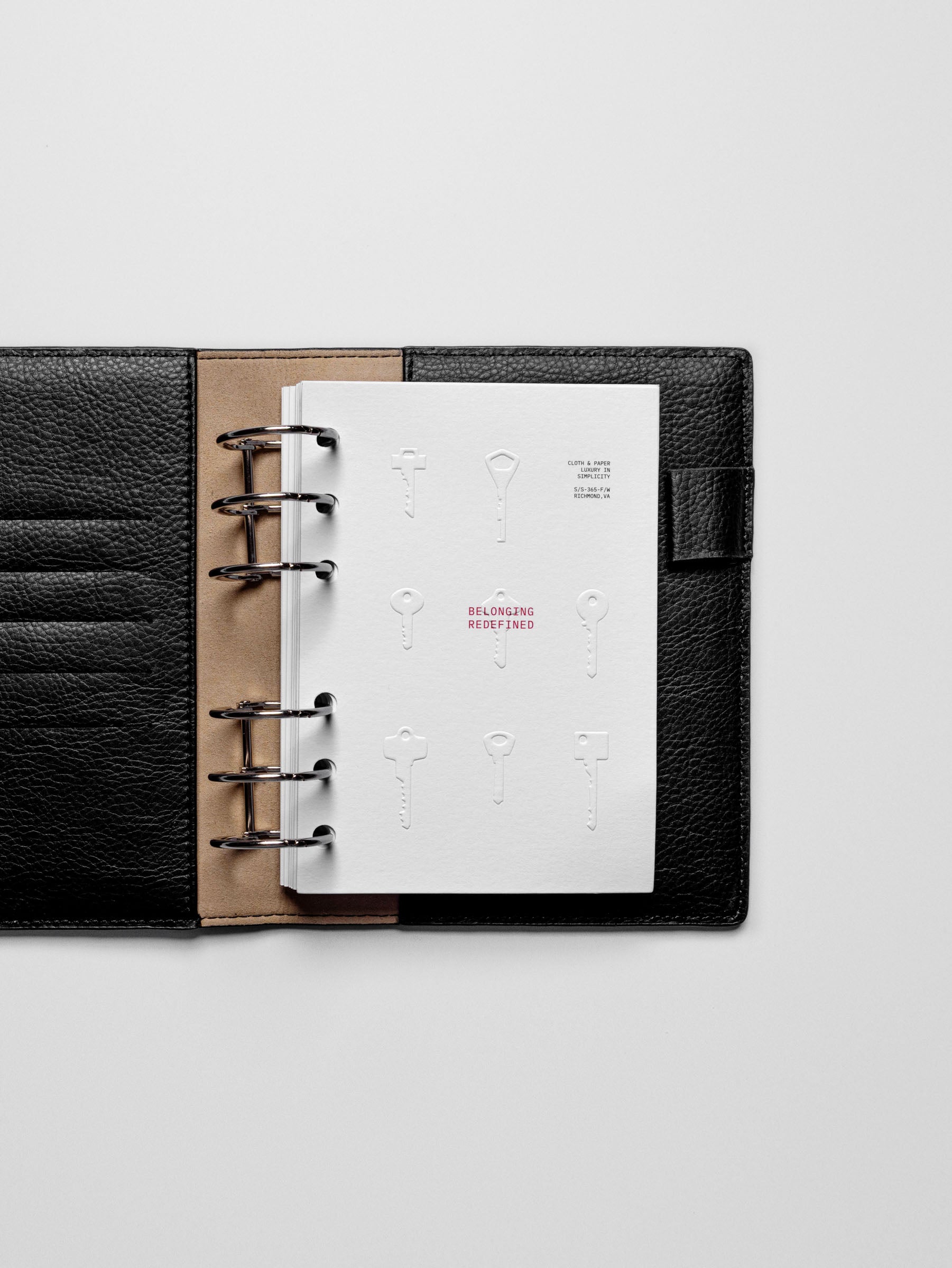 The Access Key Dashboard in a black A6 ring-bound planner