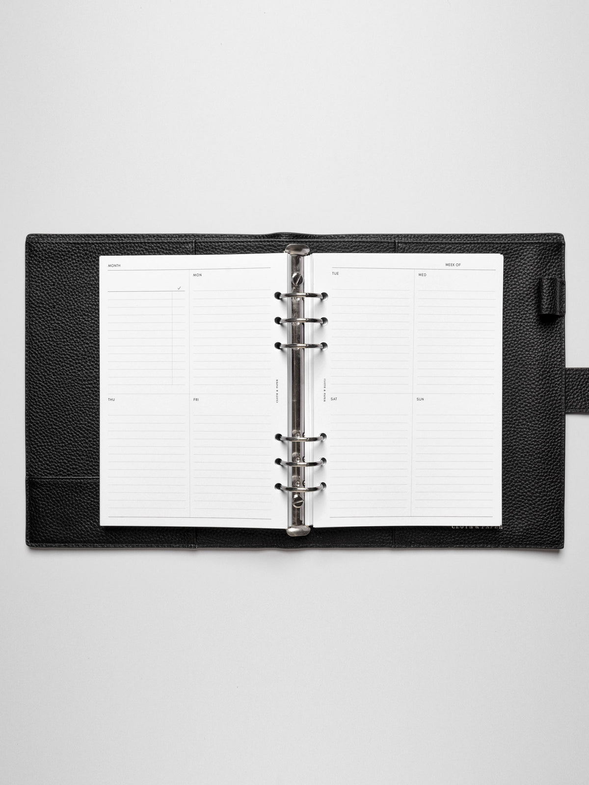 A5 insert in use inside a leather planner.