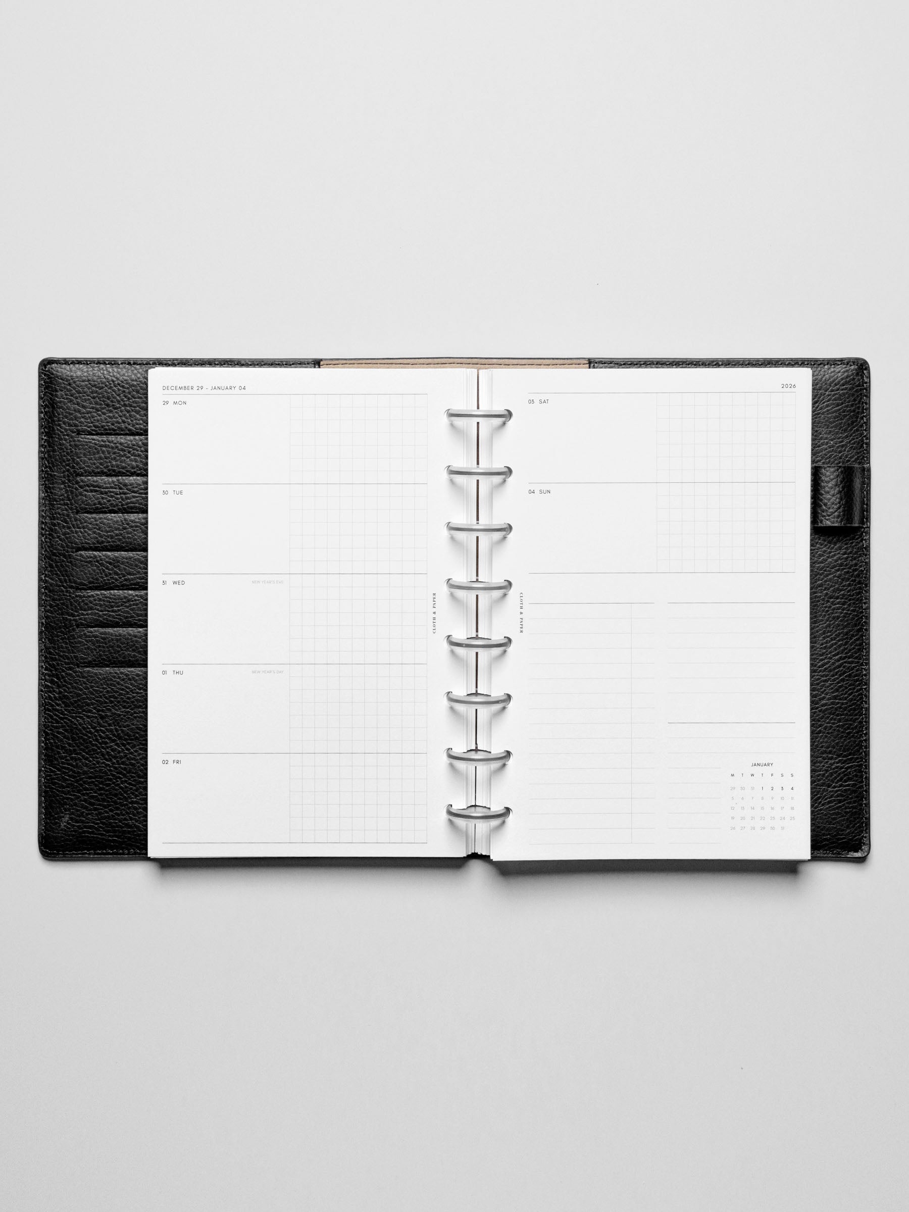 Inserts in use inside a leather planner.