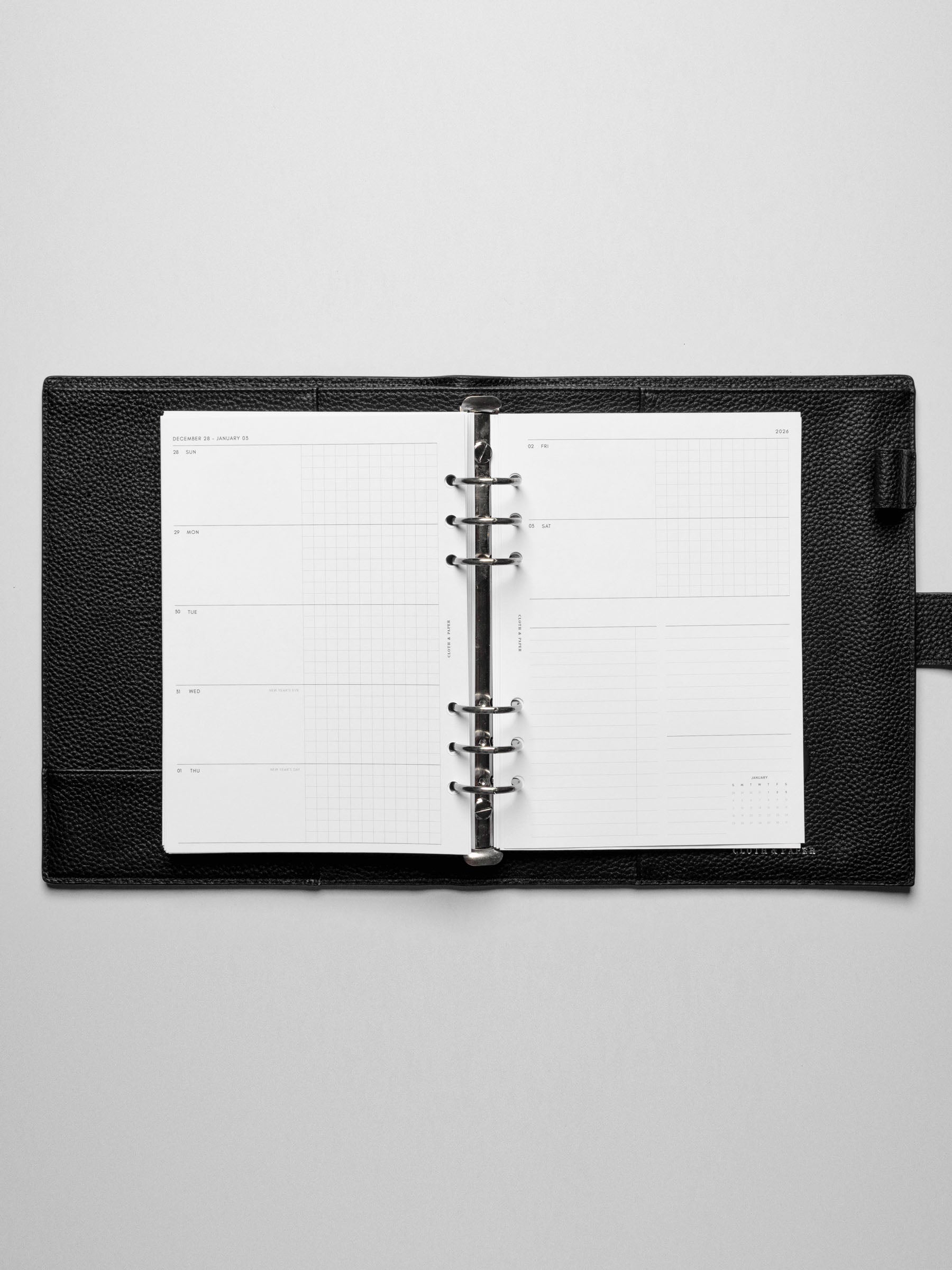 Inserts in use inside a leather planner.