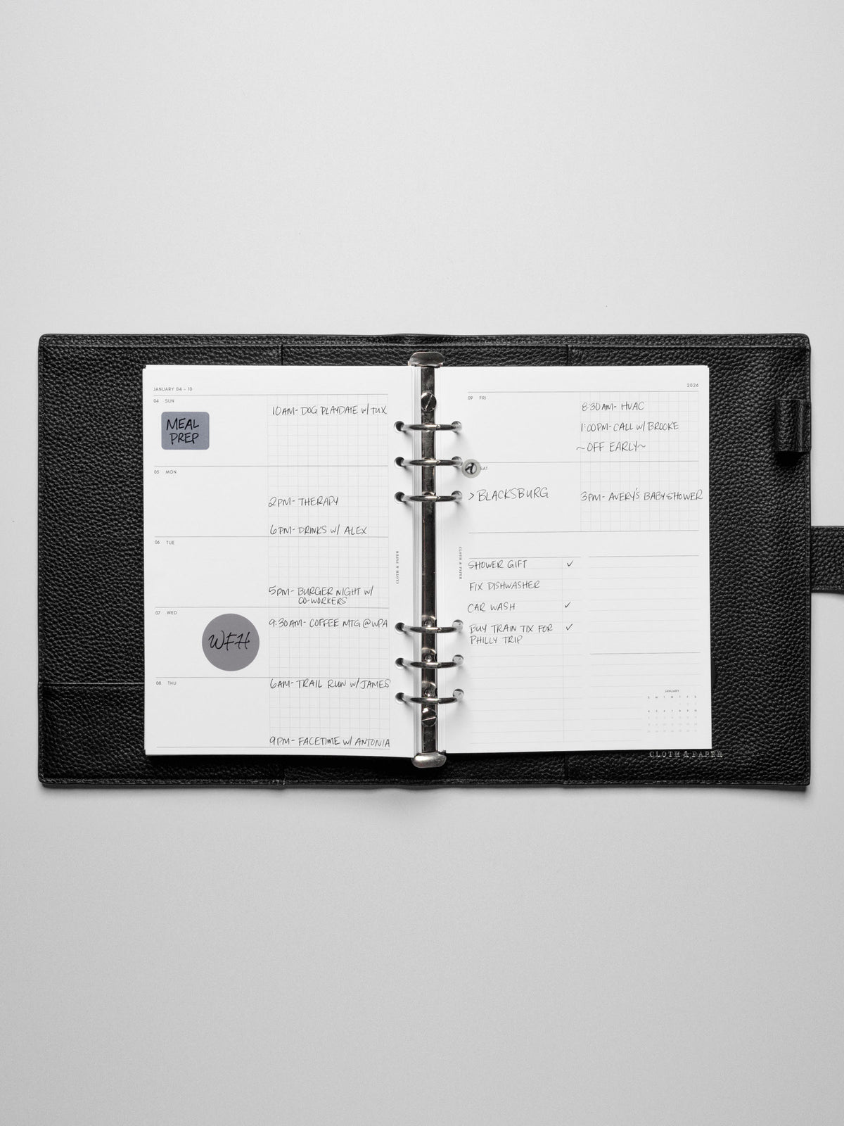 Inserts in use inside a leather planner.