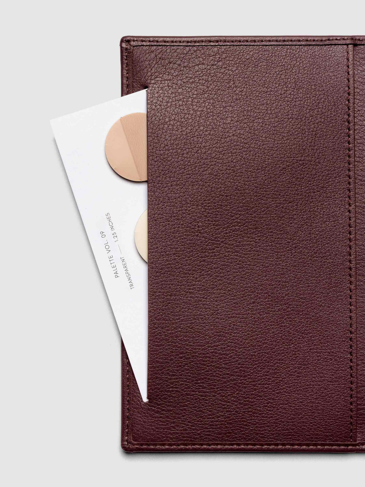 Close-up of Nomada Wallet slit pocket in Madrid with page flags inside
