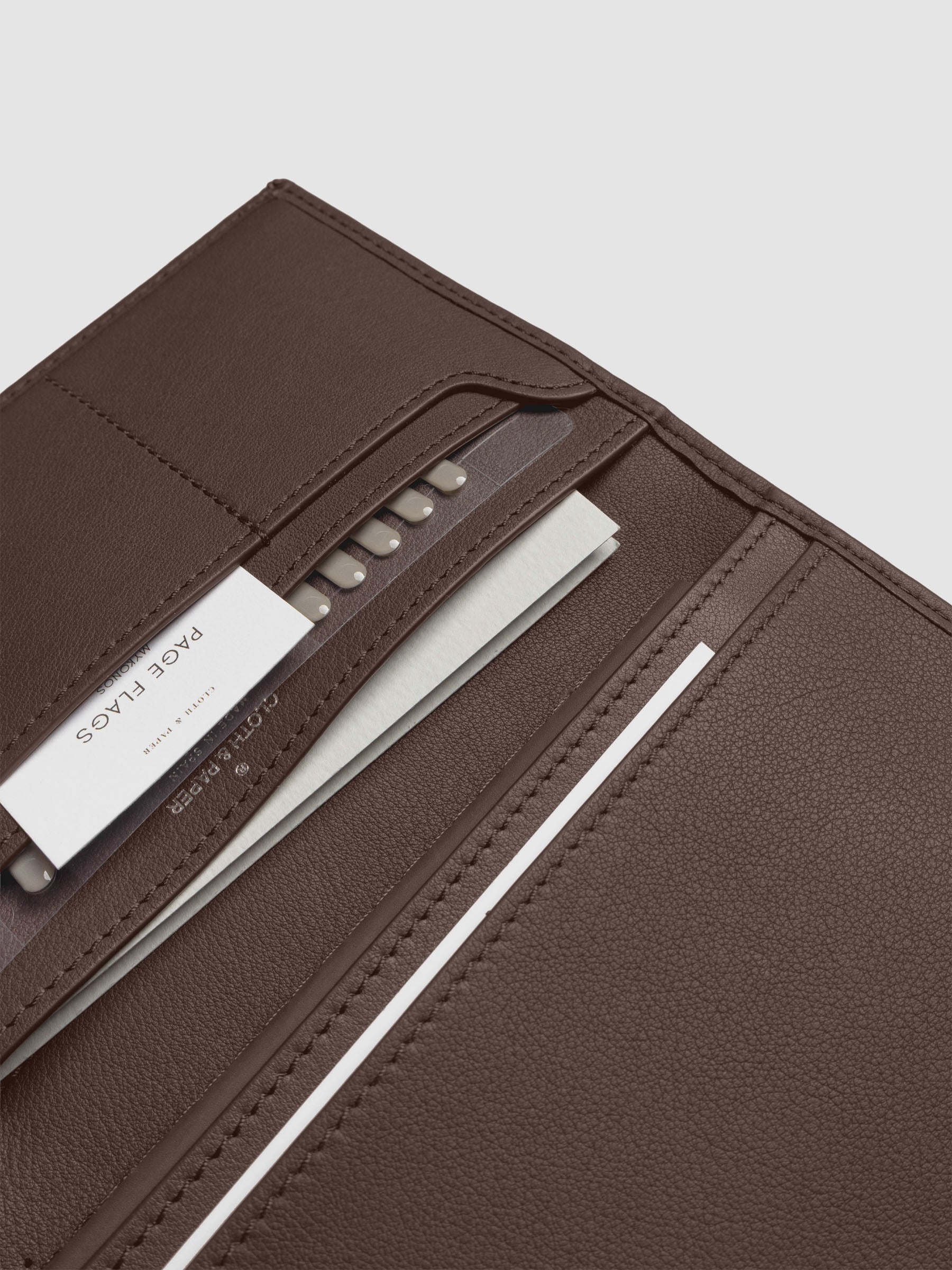 Close-up of Cloth & Paper products inside Nomada Wallet pockets in Cordoba
