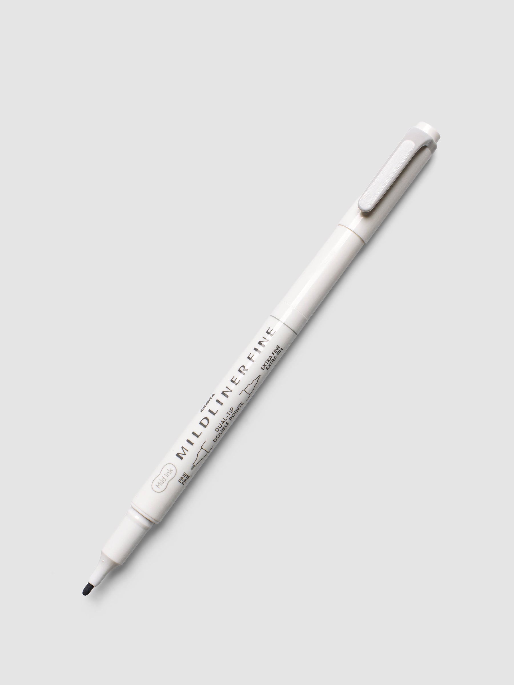 Zebra Mildliner Dual-Tip Fineliner in gray with cap removed showing fine bullet tip