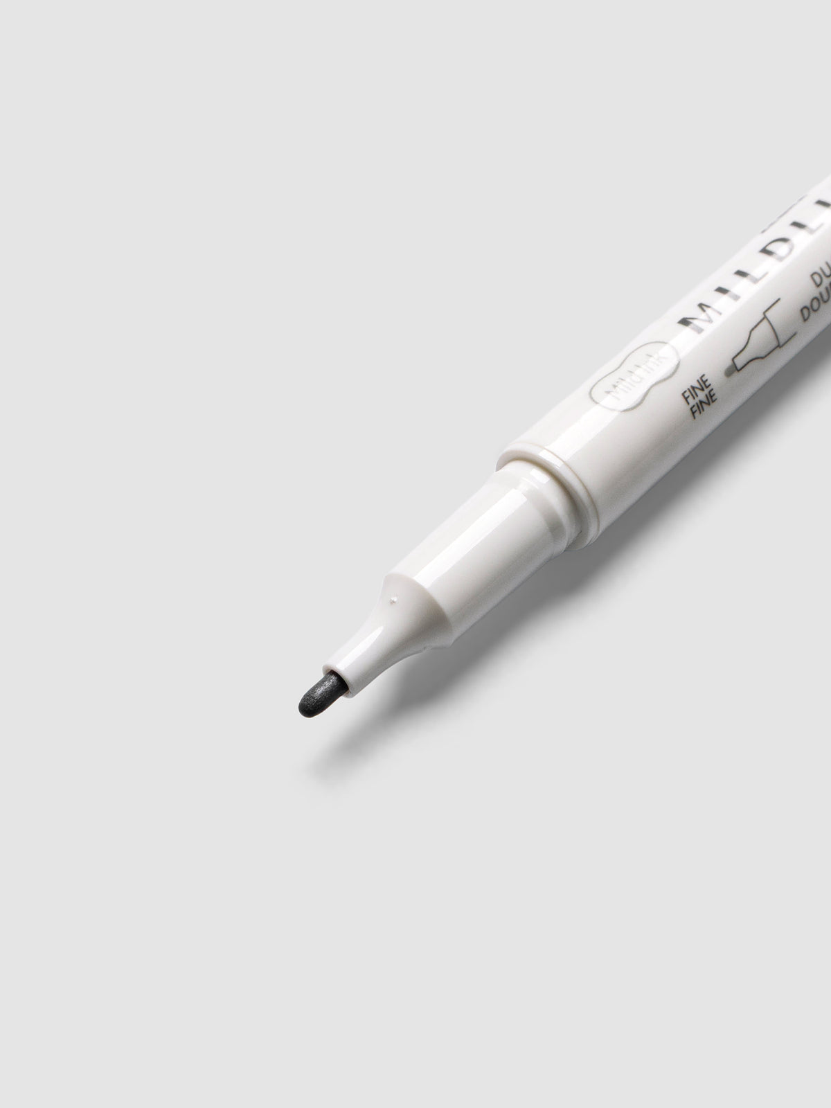 Close-up of Zebra Mildliner Dual-Tip Fineliner fine bullet tip in gray