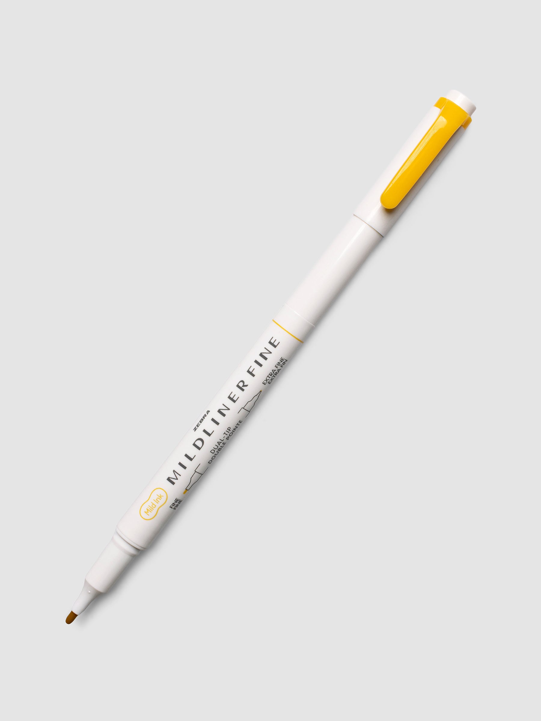 Zebra Mildliner Dual-Tip Fineliner in gold with cap removed showing fine bullet tip