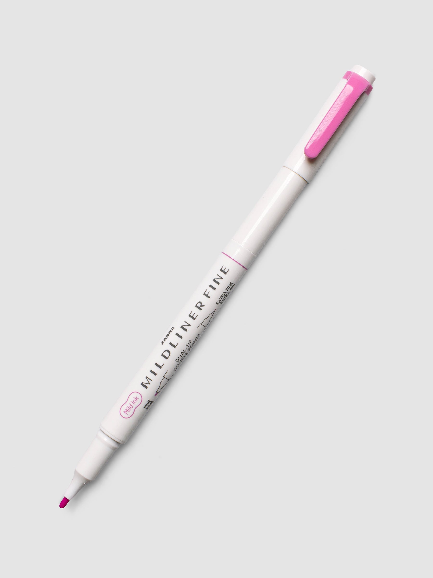 Zebra Mildliner Dual-Tip Fineliner in fuchsia with cap removed showing fine bullet tip