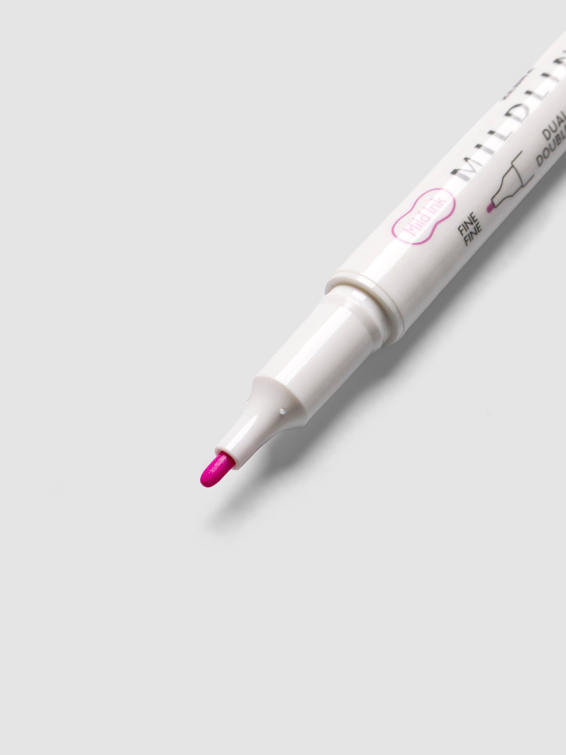 Close-up of Zebra Mildliner Dual-Tip Fineliner fine bullet tip in fuchsia
