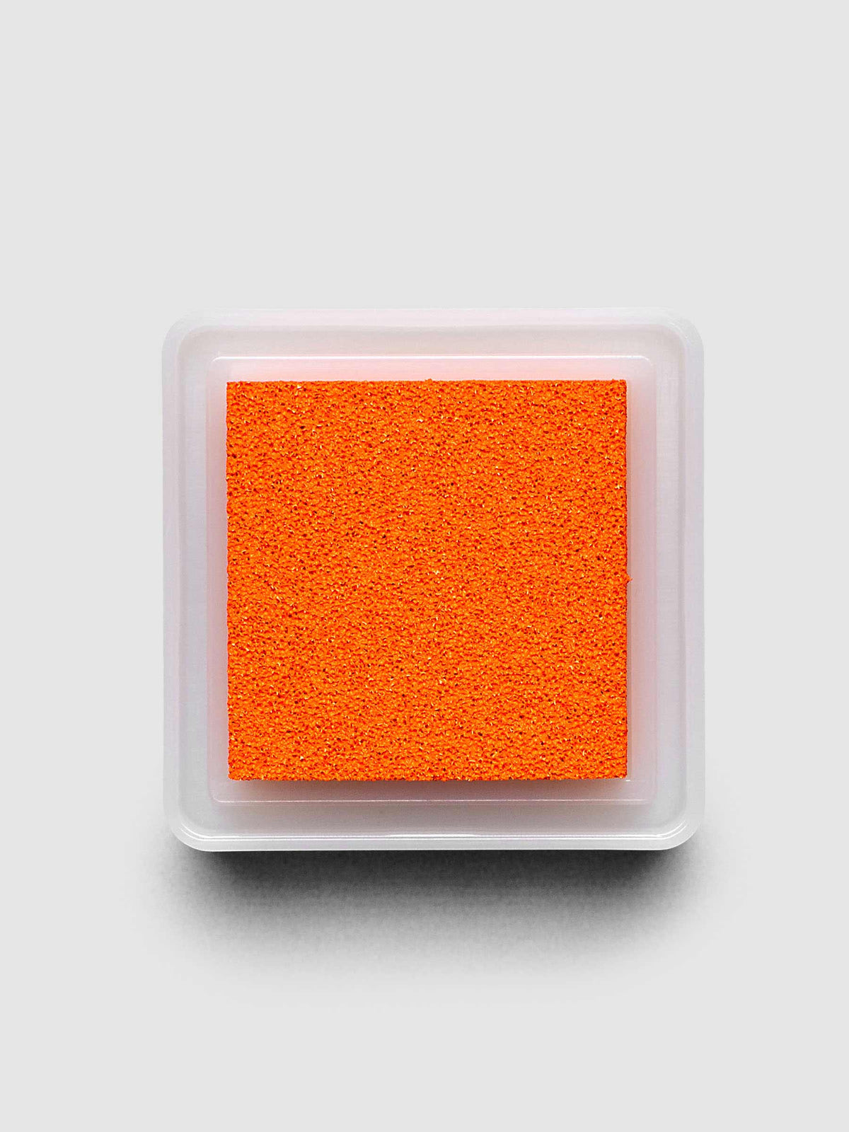 Artnic Stamp Ink Pad in orange seen from above with cover removed