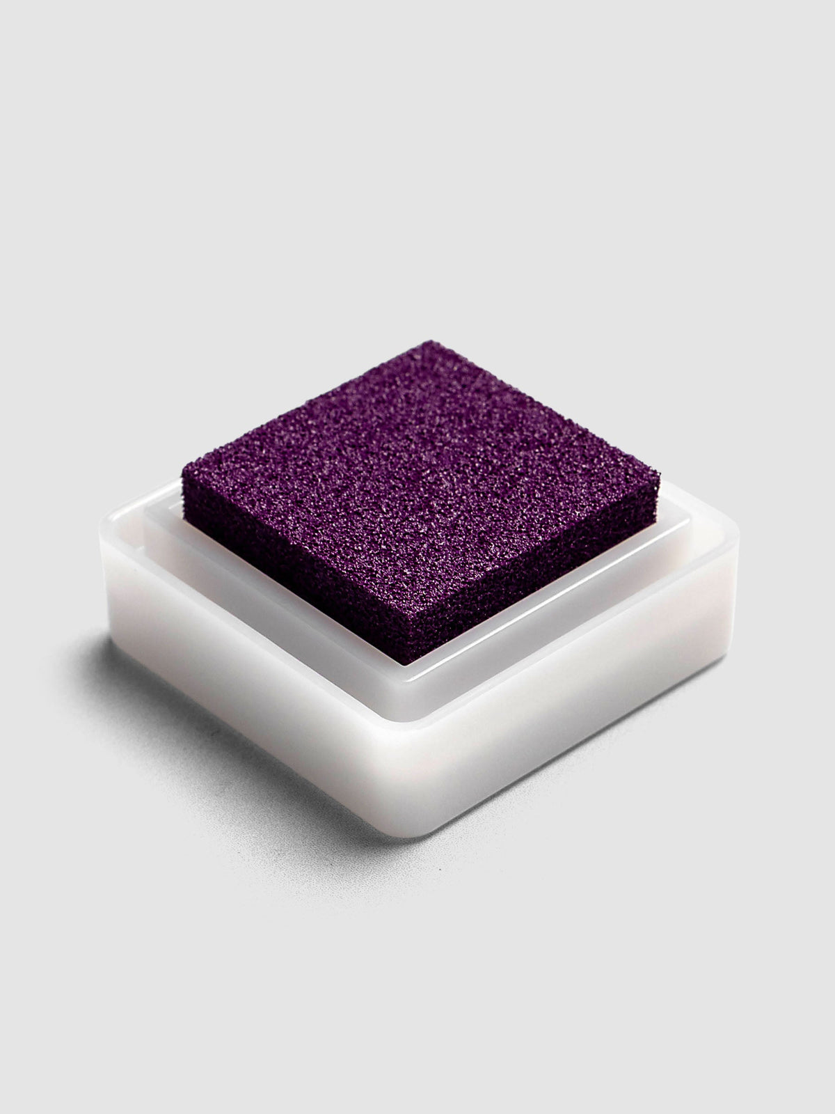 Artnic Stamp Ink Pad in boysenberry seen from the side with cover on