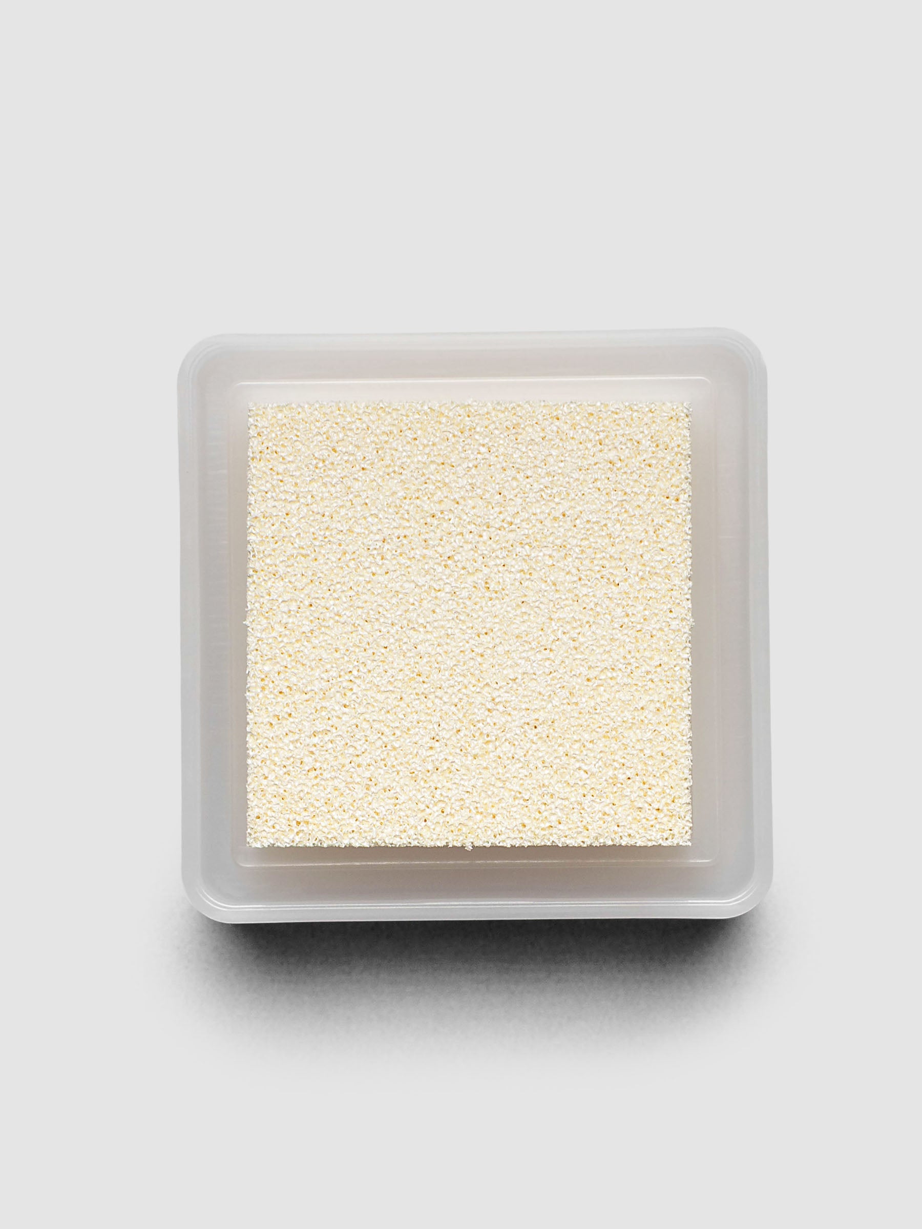 Artnic Stamp Ink Pad in white seen from the side with cover removed