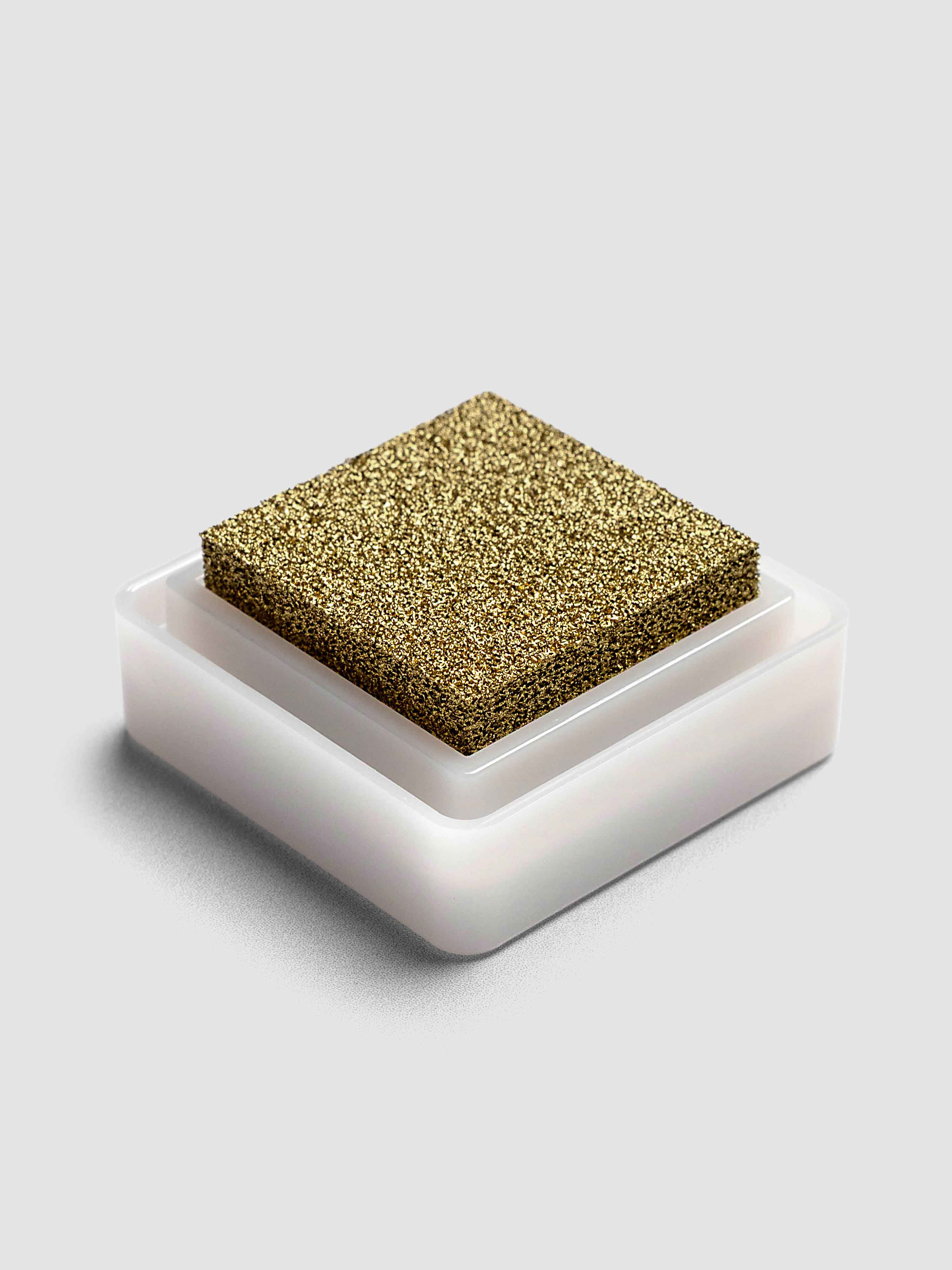 Artnic Stamp Ink Pad in gold seen from the side with cover removed