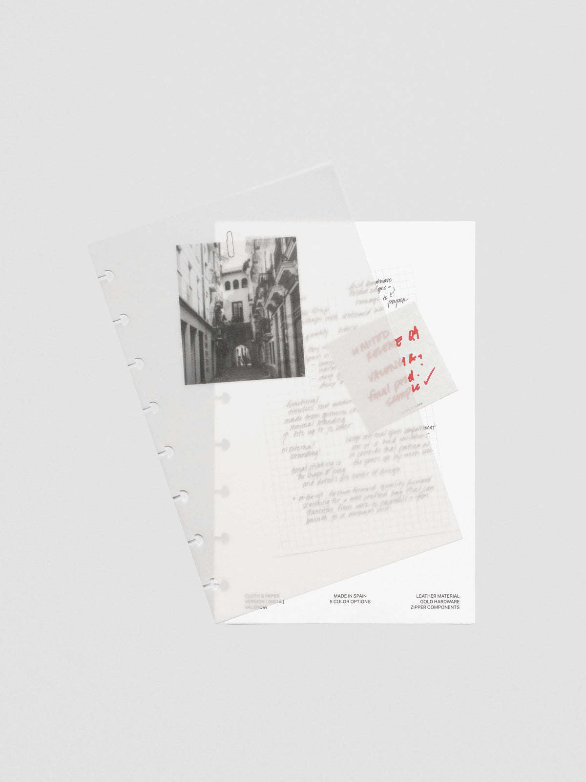 Translucent vellum overlay page from the half-letter Behind the Scenes Dashboard Duo insert, featuring a printed black-and-white photograph of a European street attached over handwritten notes.