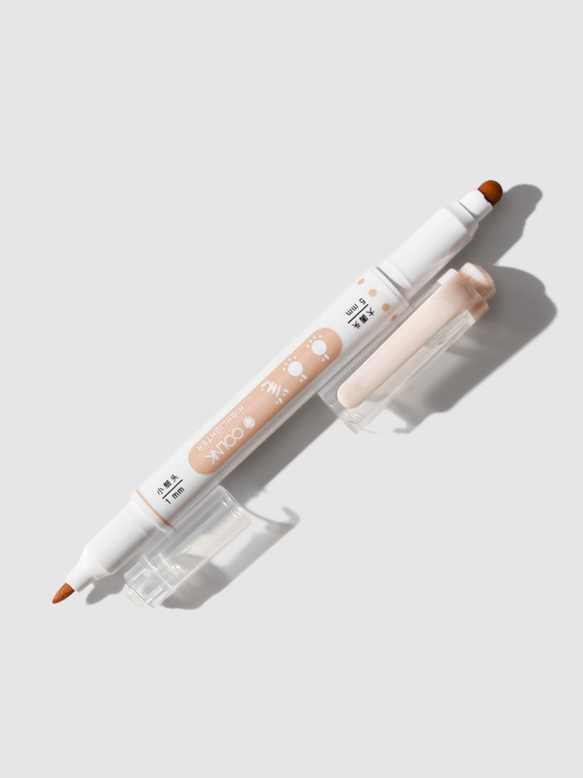 Colnk Double Ended Highlighter with caps removed displayed on a neutral background. 