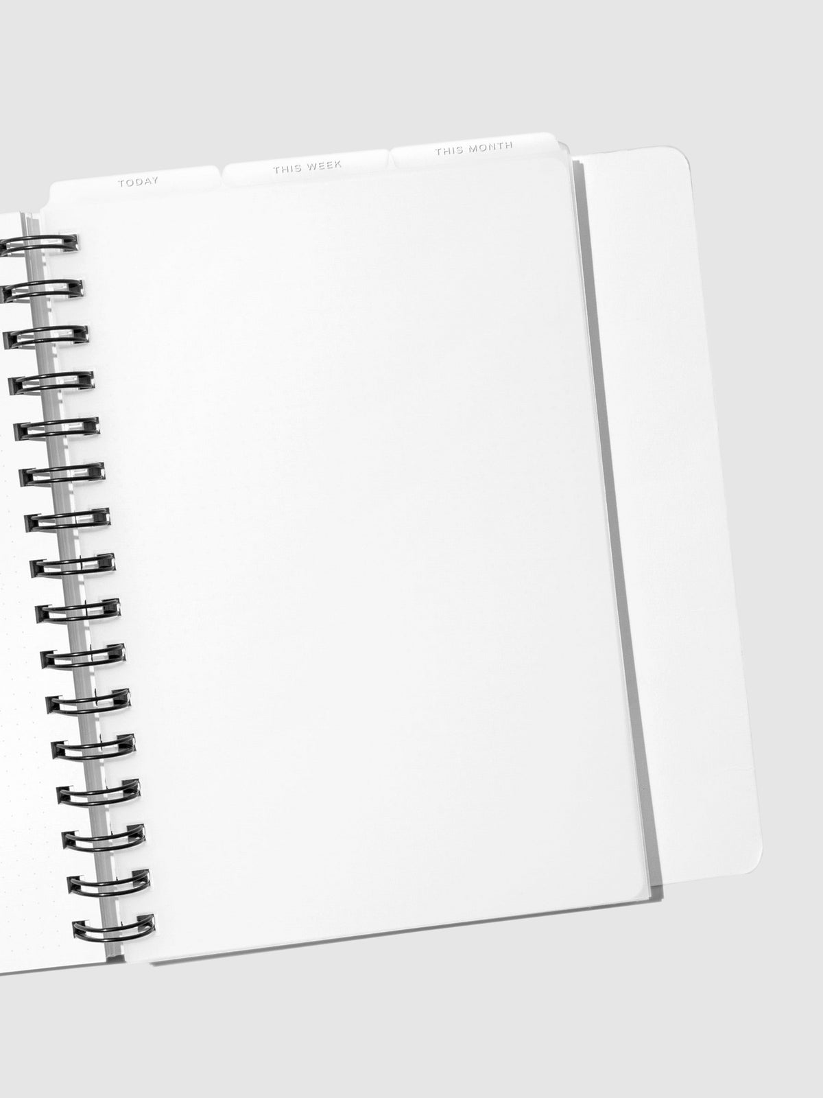 A5 Spiral White Foil Cadence Tab Dividers displayed in a spiral planner.