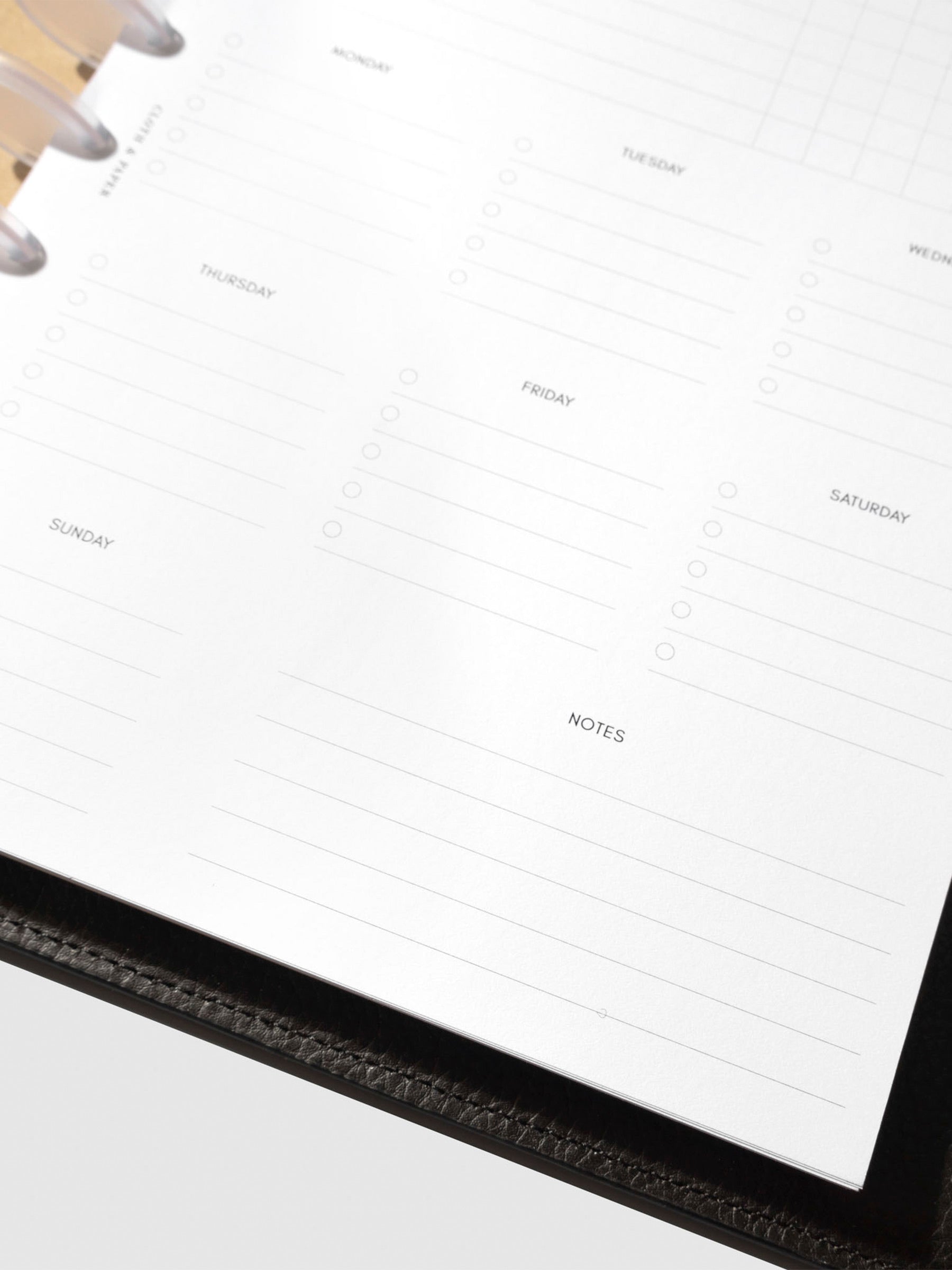 Insert in use inside a black leather planner.