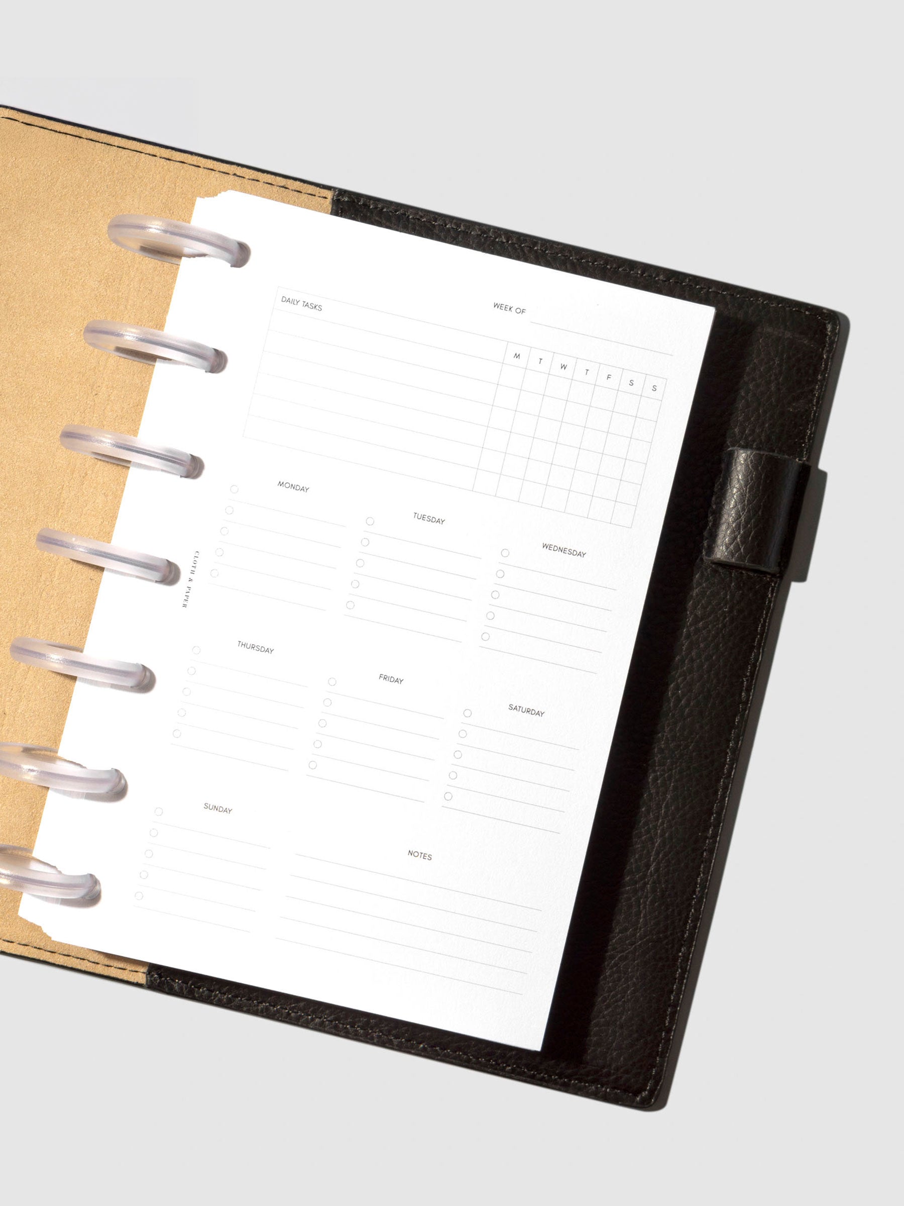 Insert in use inside a black leather planner.