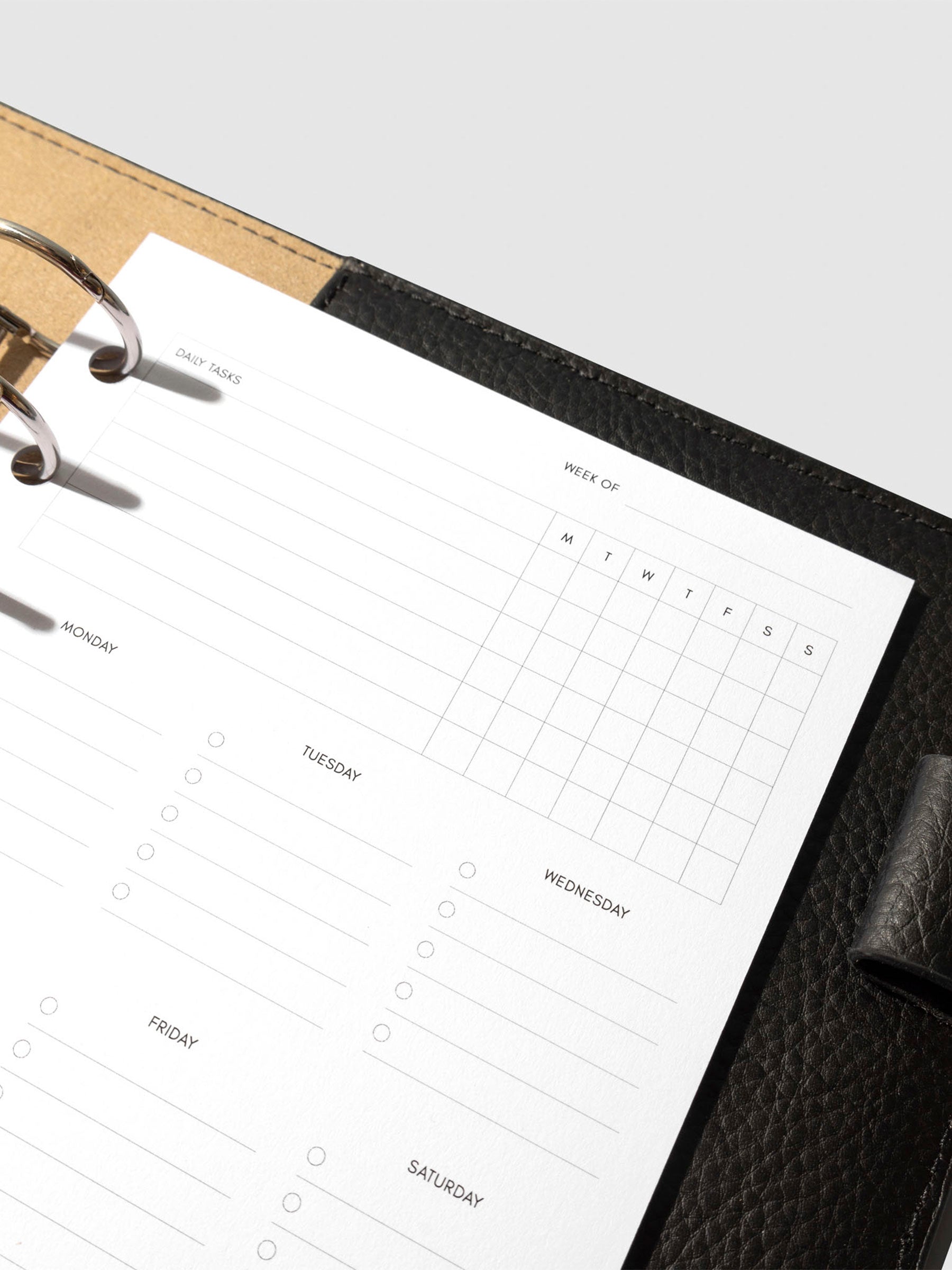 Insert in use inside a black leather planner.