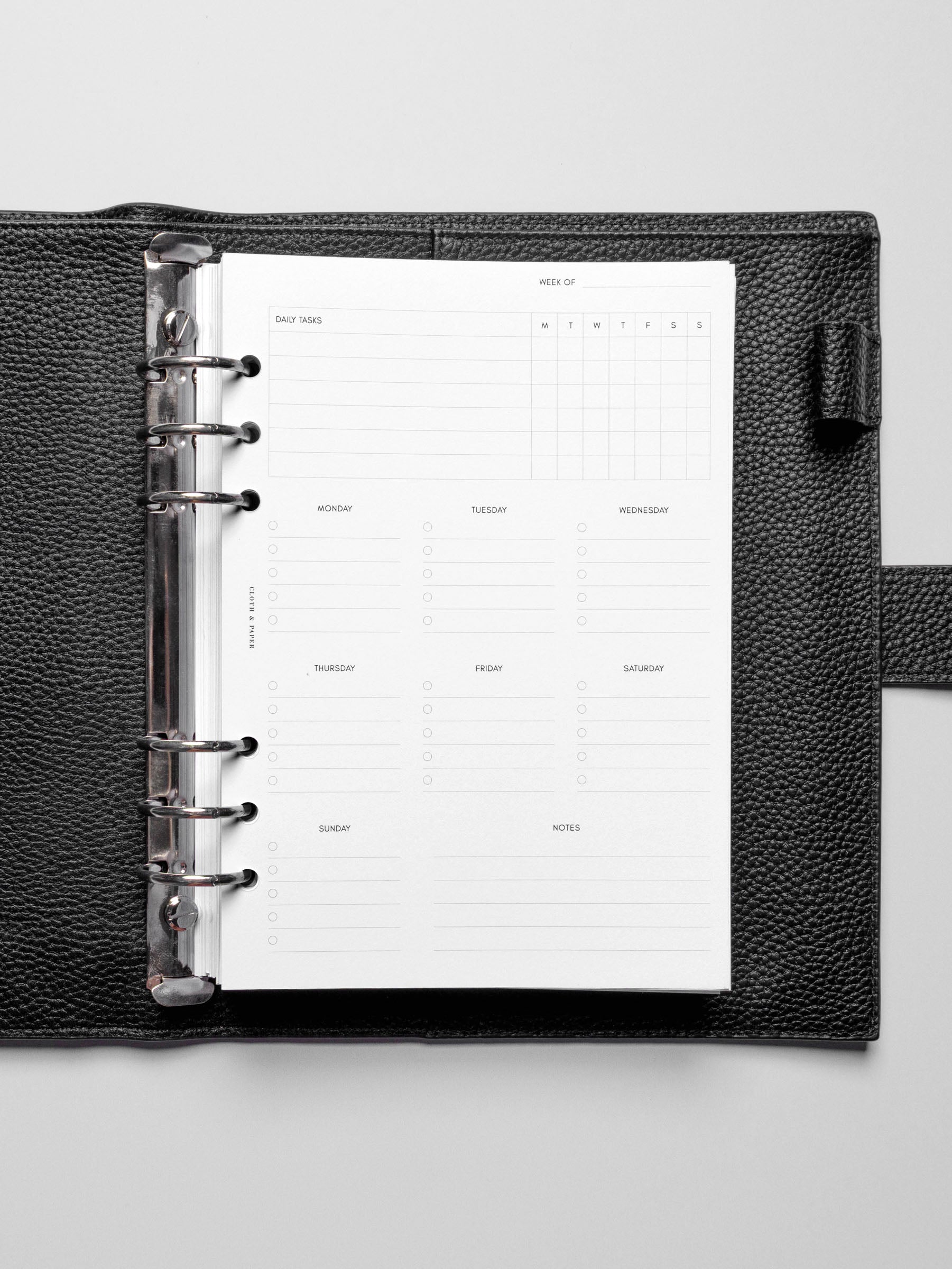 Insert in use inside a black leather planner.