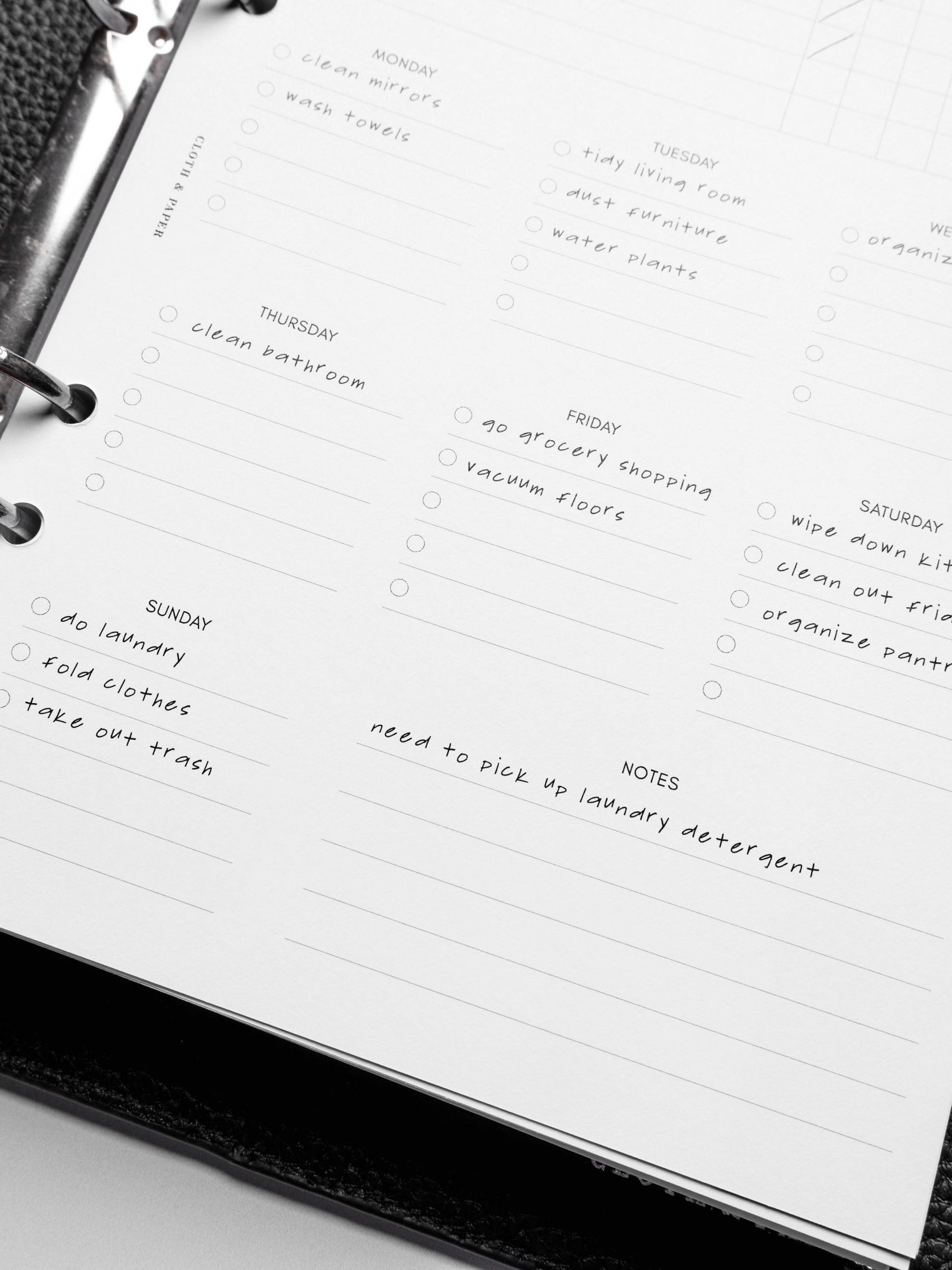 Insert in use inside a black leather planner.