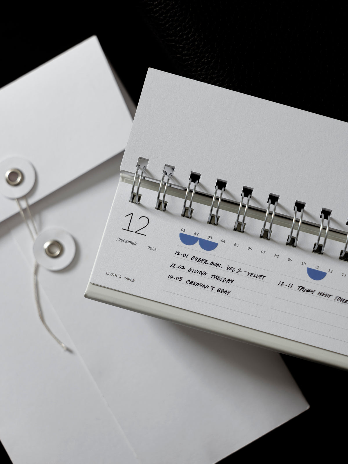 2026 Spiral Desk Calendar against a dark background.
