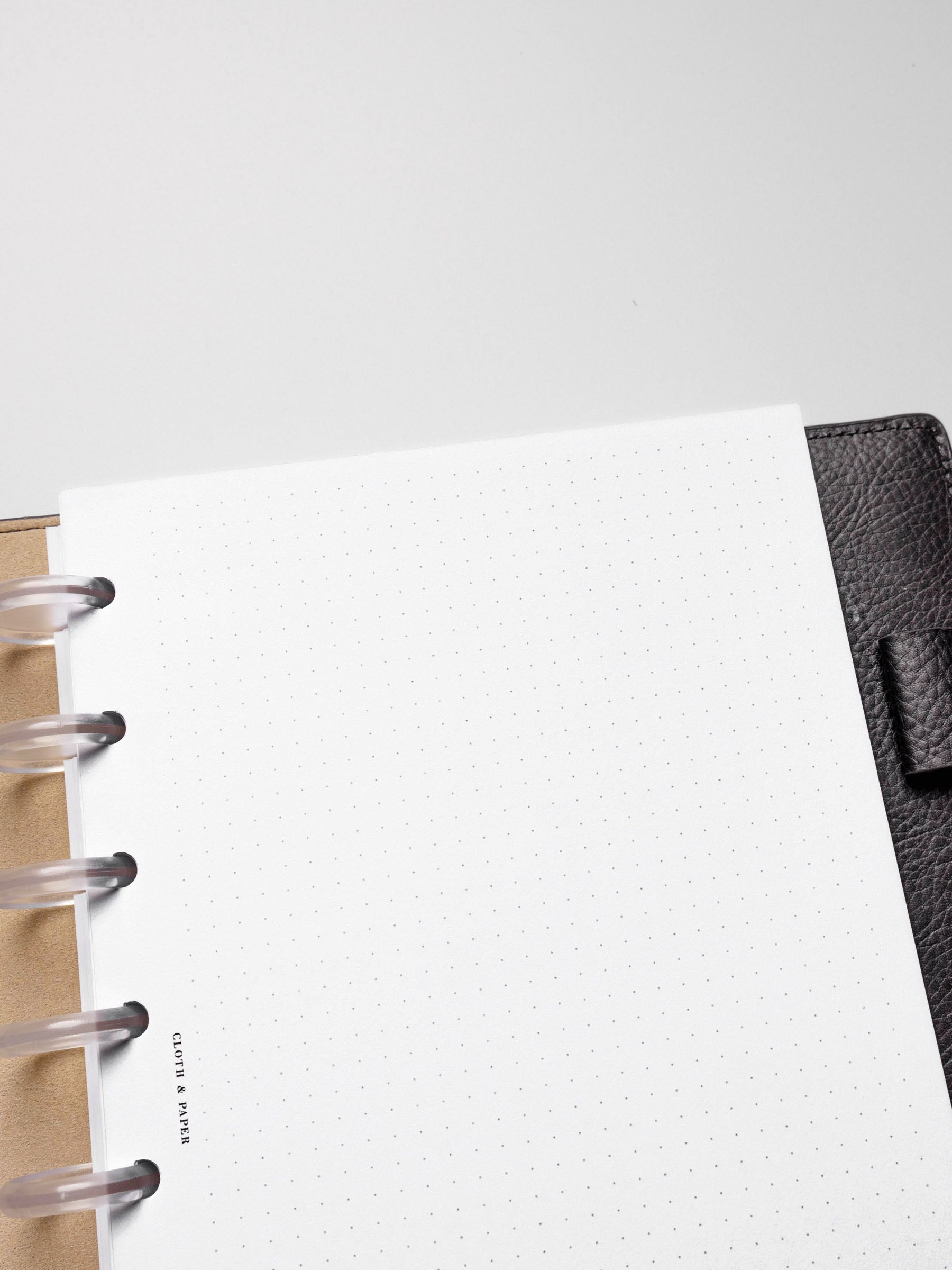 Insert in use inside a black leather planner.